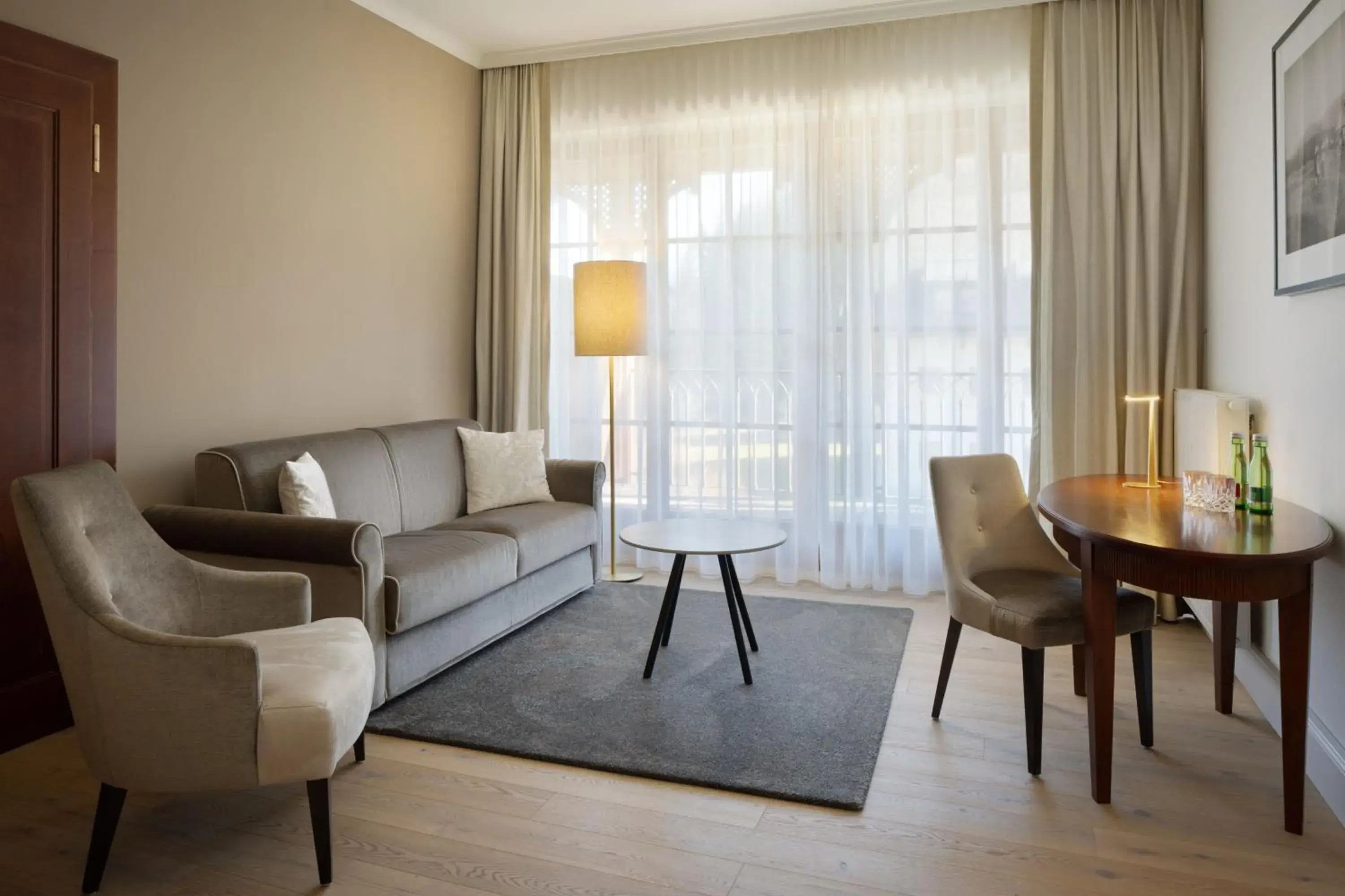 Living room in Arabella Jagdhof Resort am Fuschlsee, a Tribute Portfolio Hotel Living room in Arabella Jagdhof Resort am Fuschlsee, a Tribute Portfolio Hotel