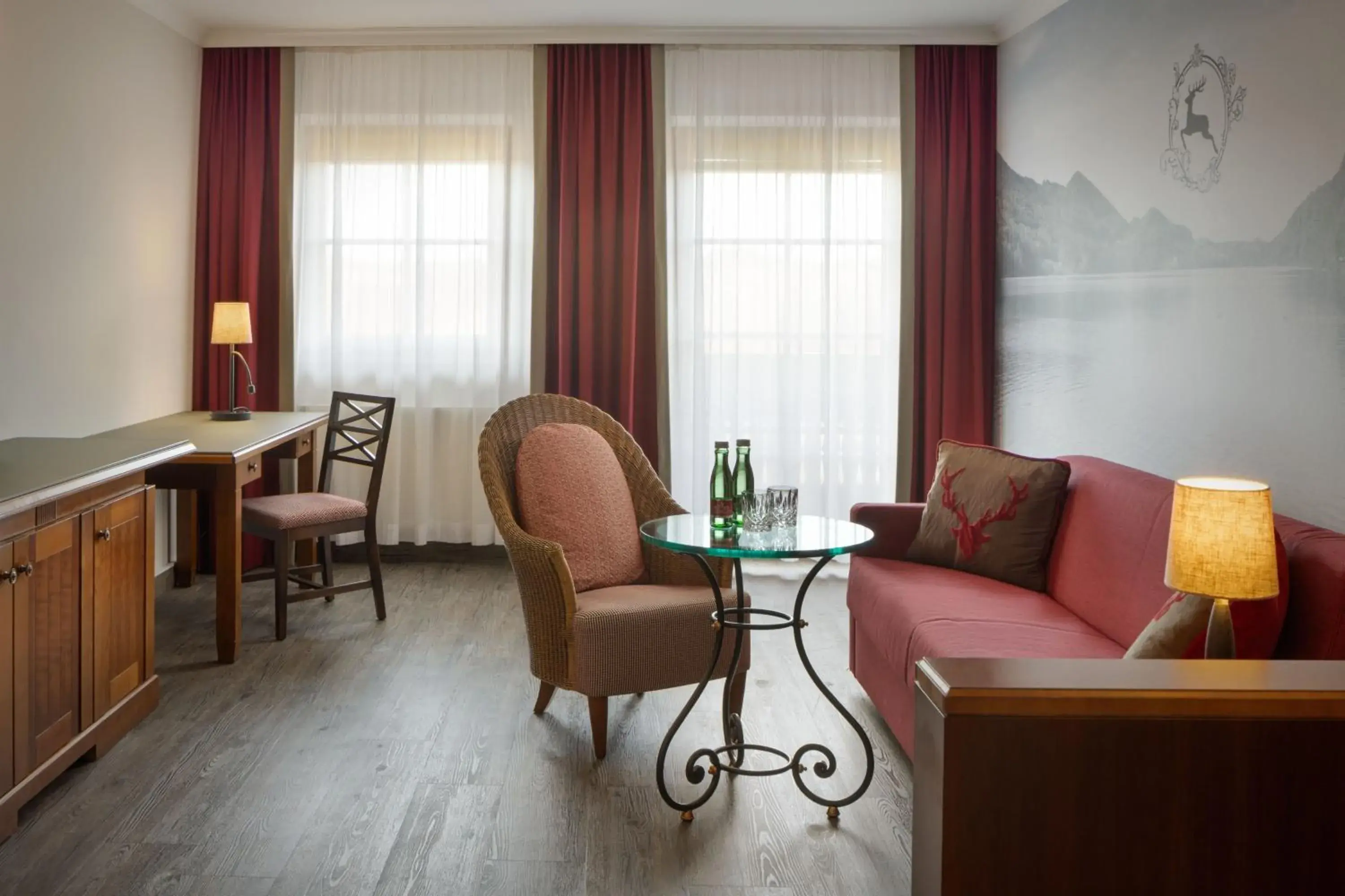 Living room in Arabella Jagdhof Resort am Fuschlsee, a Tribute Portfolio Hotel Living room in Arabella Jagdhof Resort am Fuschlsee, a Tribute Portfolio Hotel