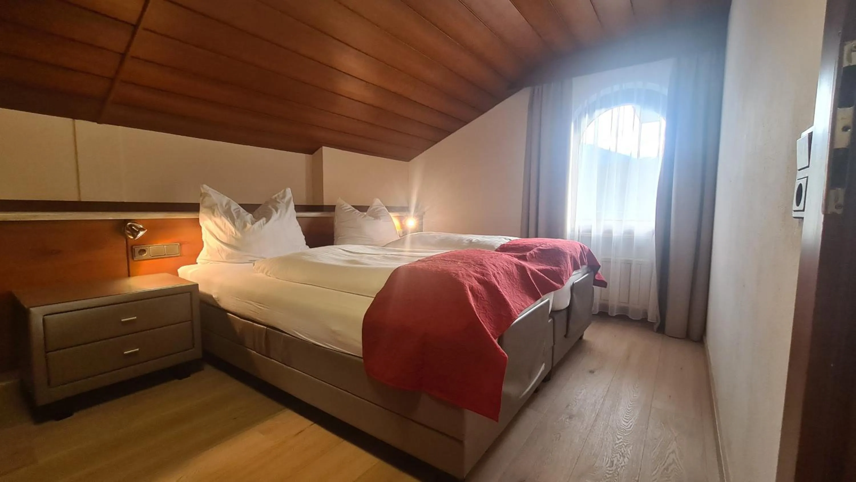 Bed in Hotel Tyrolis