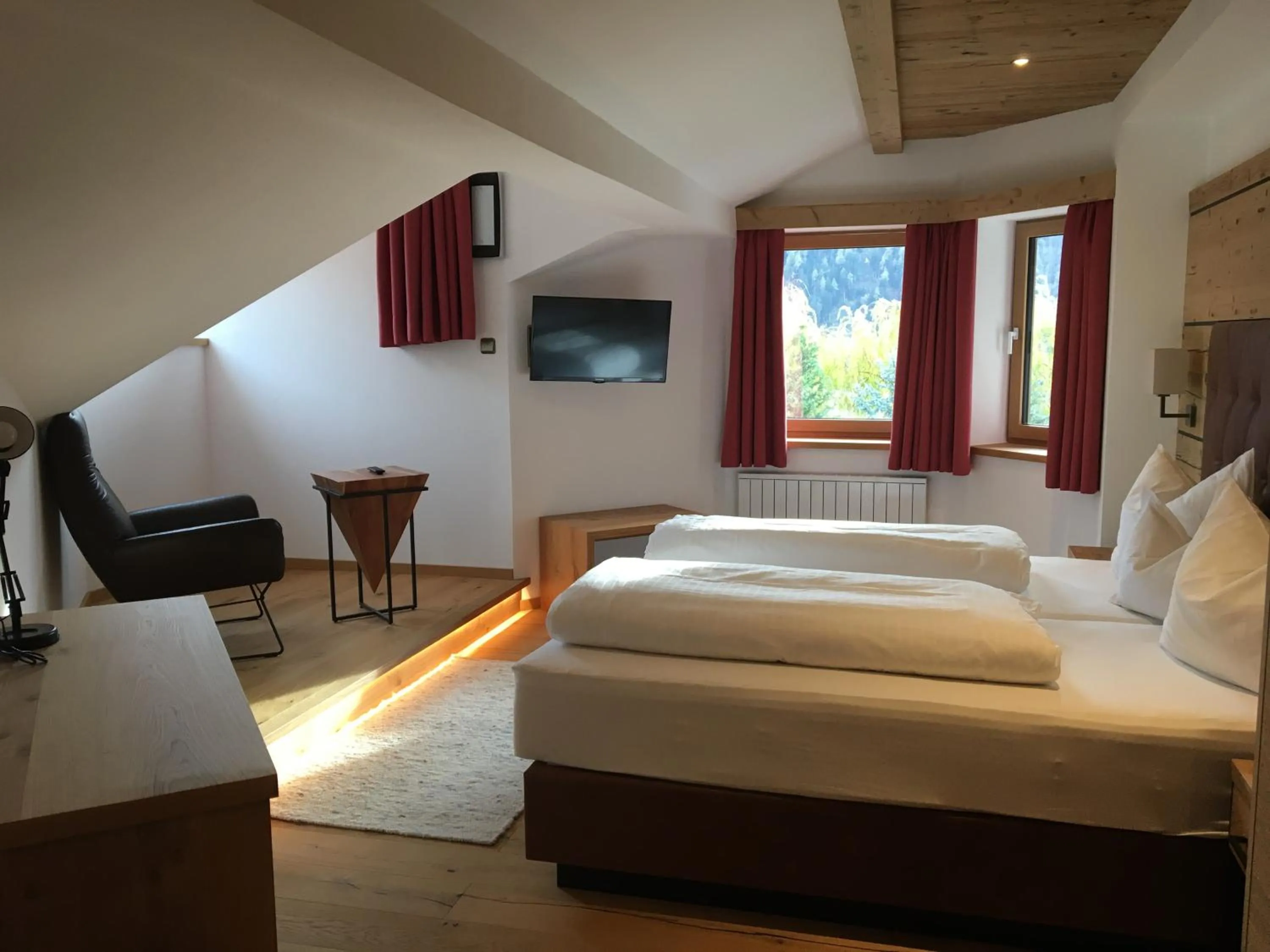 Bed in Hotel Tyrolis