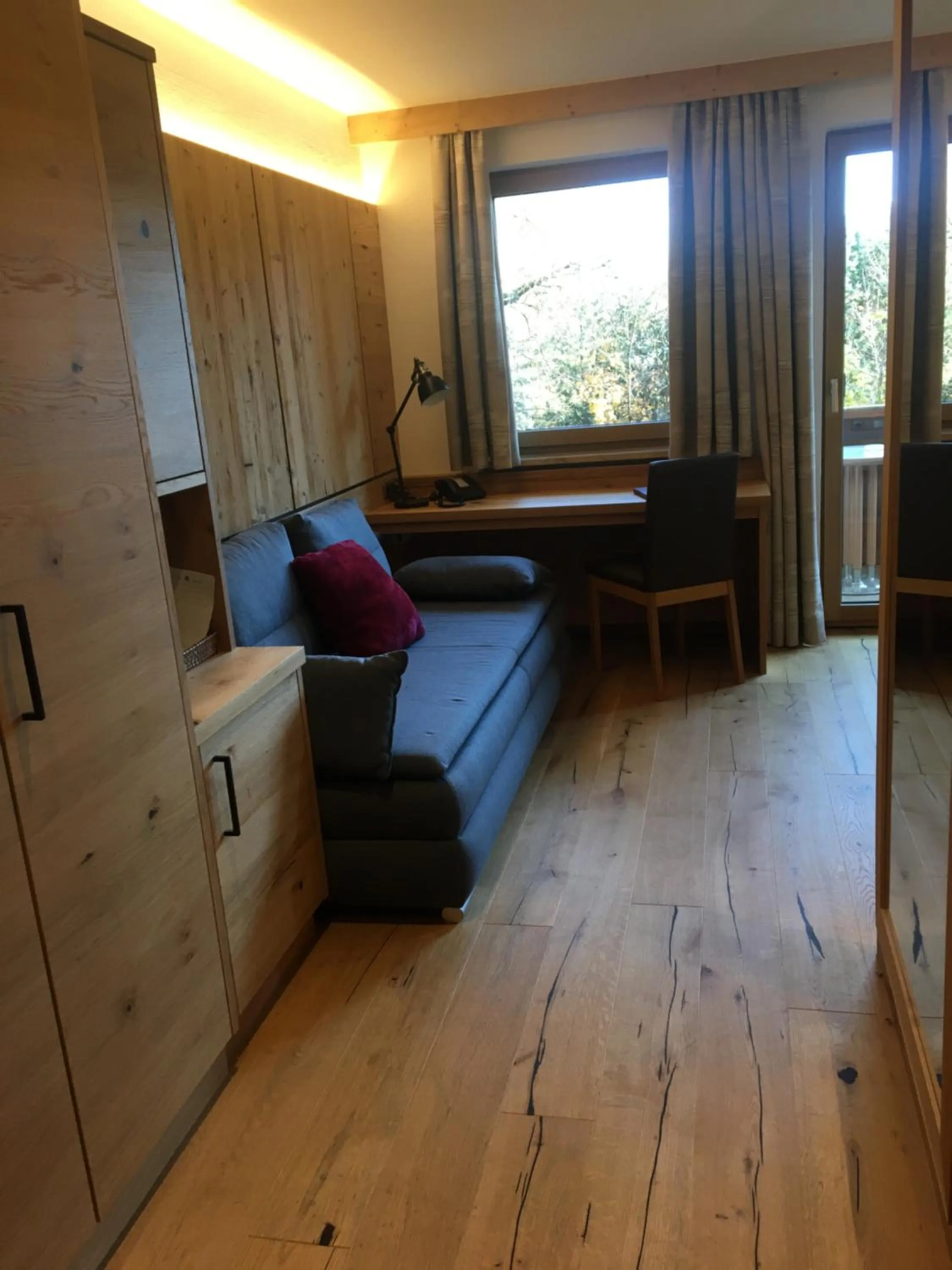 Seating area, Bed in Hotel Tyrolis