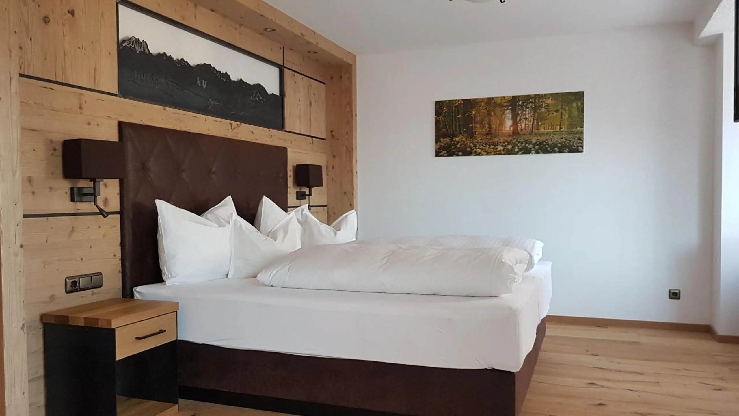 Bed in Hotel Tyrolis