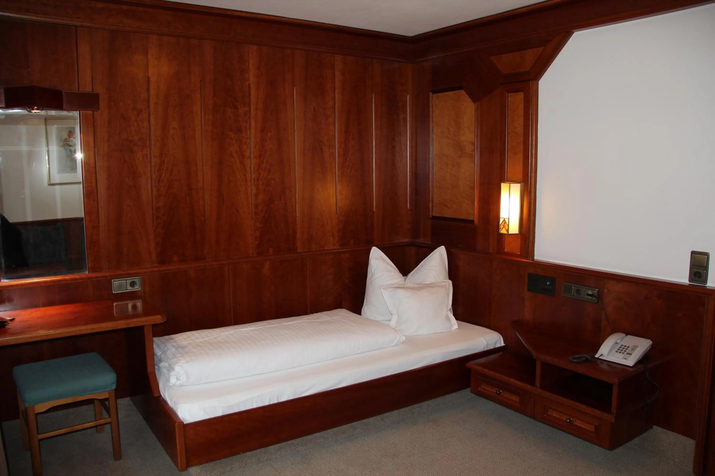 Bed in Hotel Tyrolis