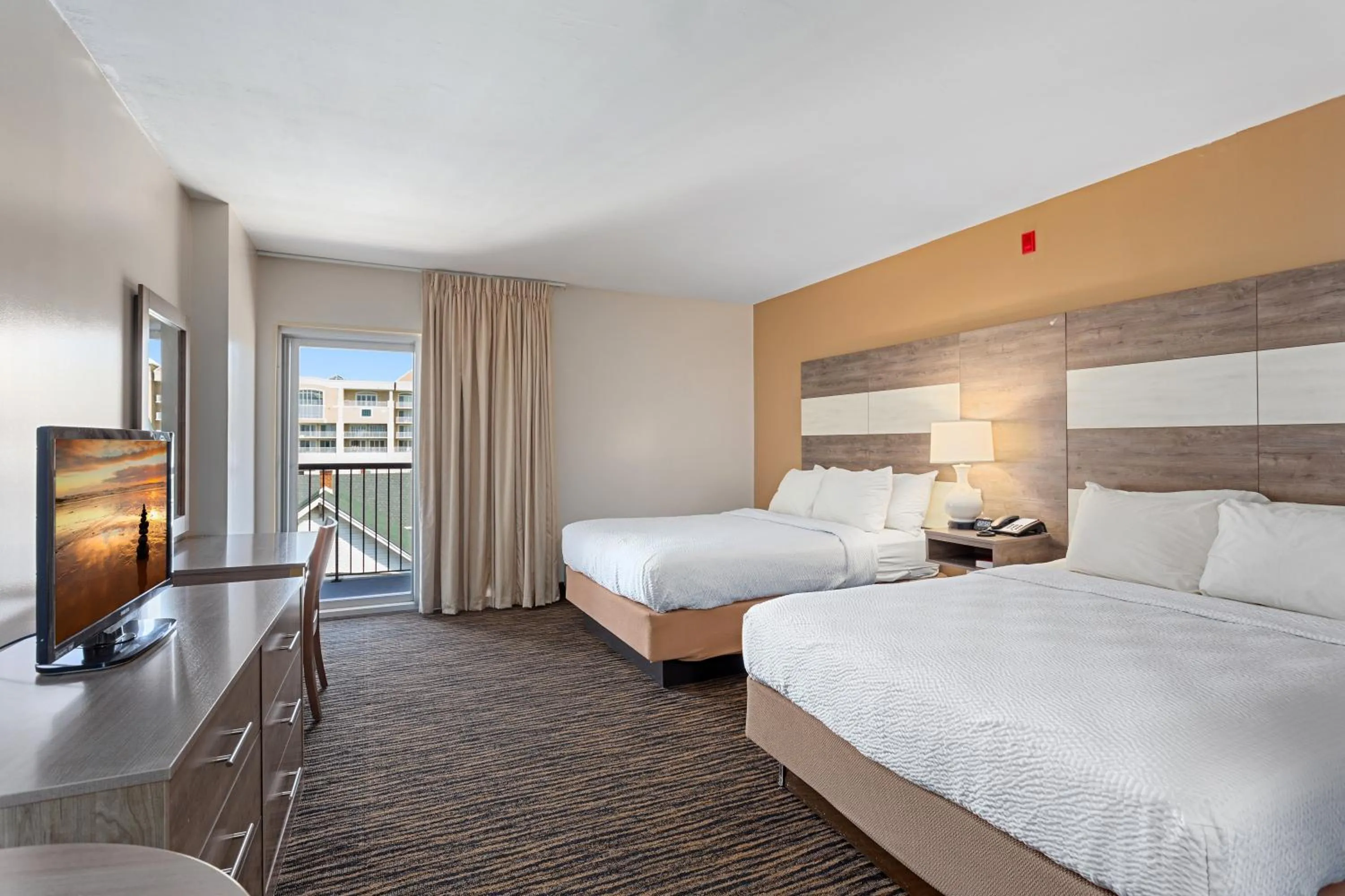 Bed in Americana Motor Inn on Boardwalk