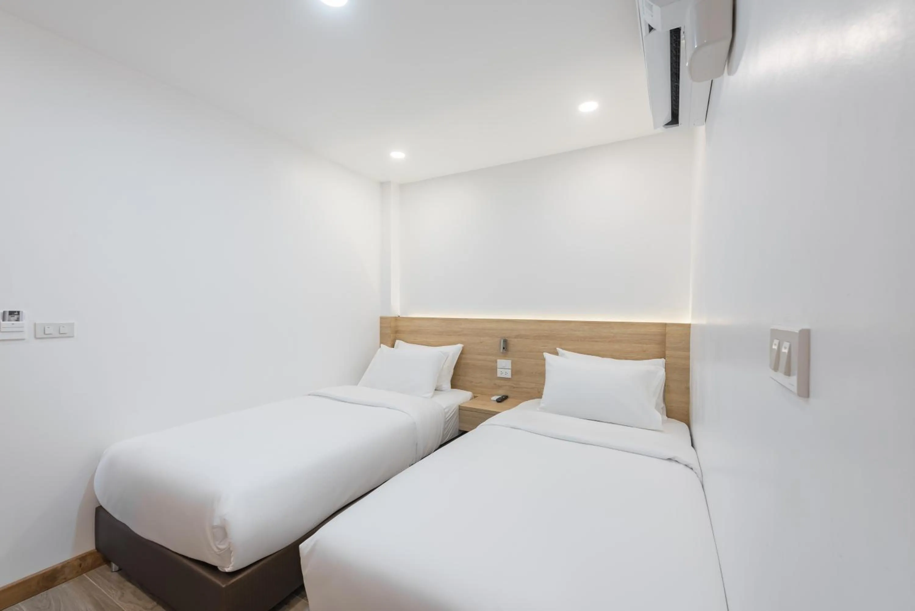 Bed in Chiangkhan River Walk Hotel