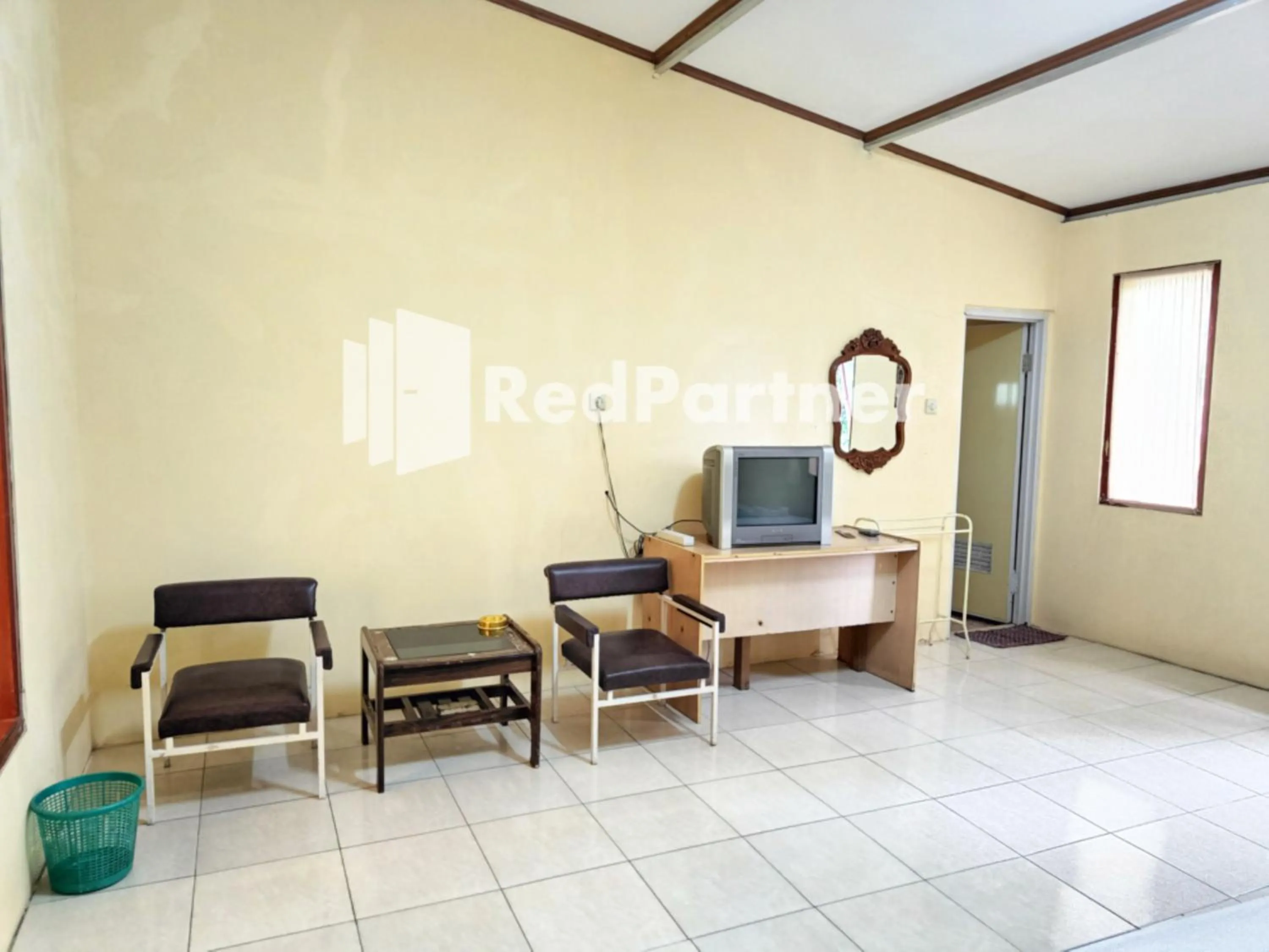 Bedroom in Hotel Anita Baturaden Mitra RedDoorz