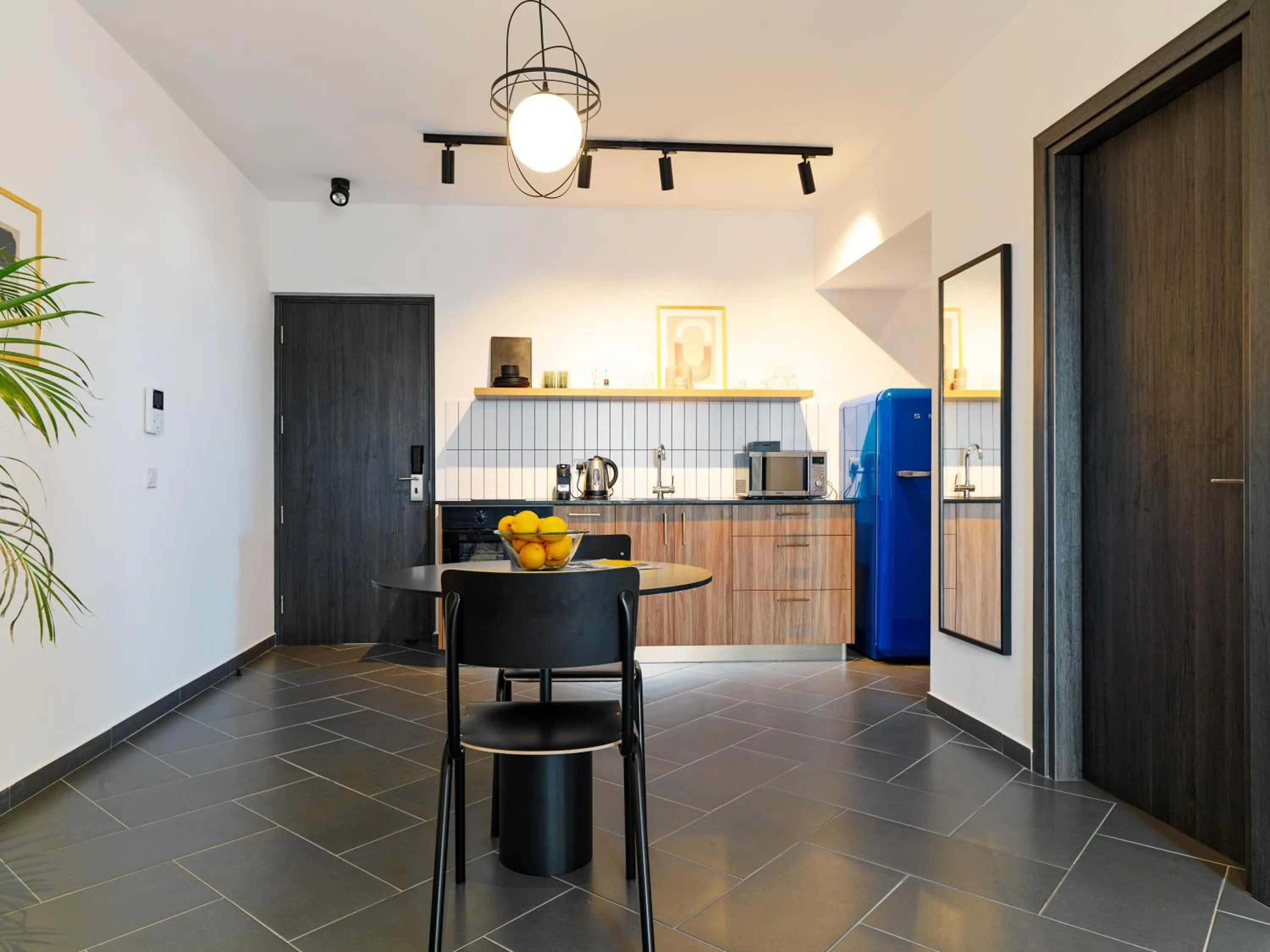 Kitchen or kitchenette in LIV URBAN Suites