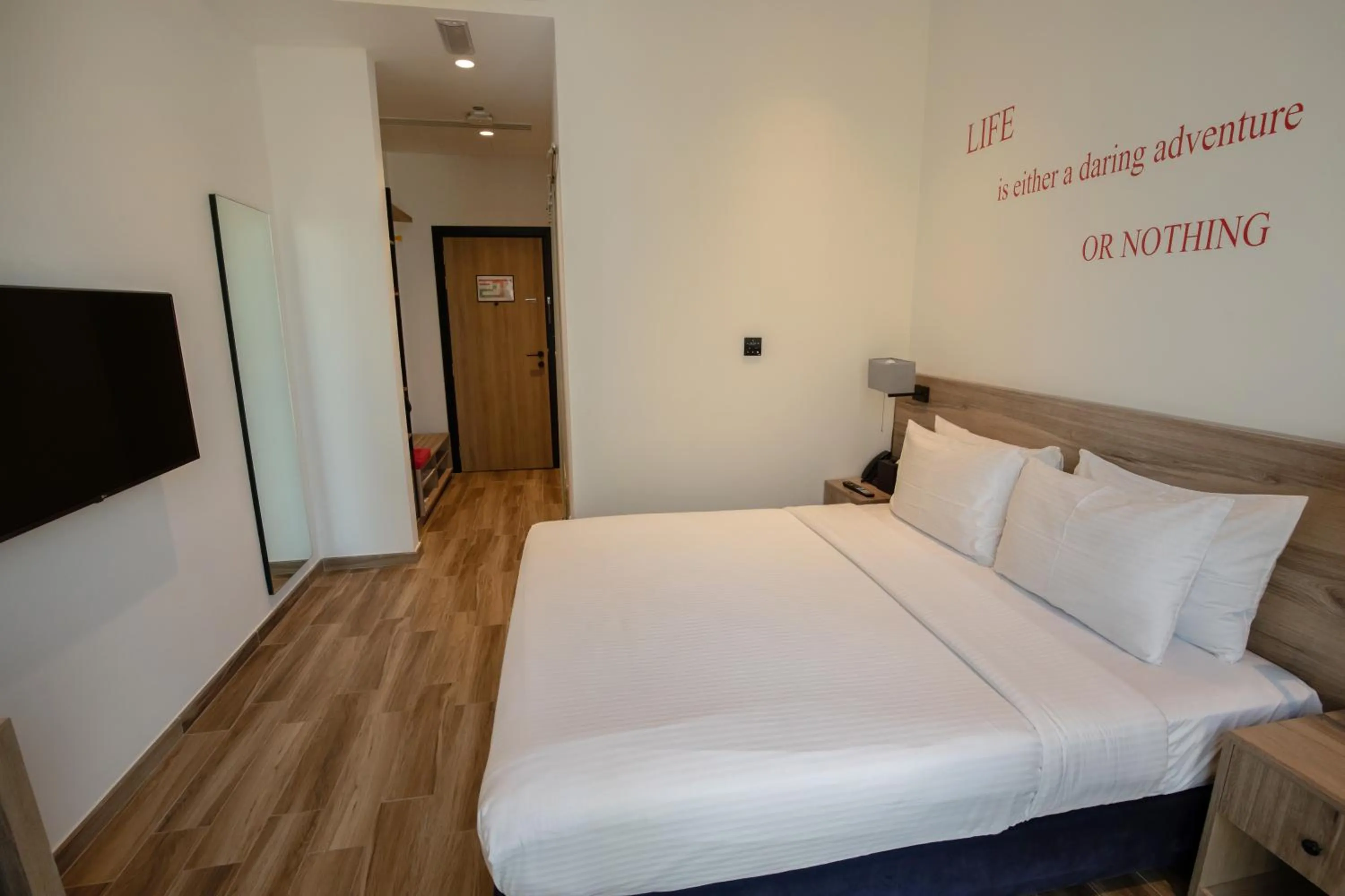 Bed in Kingsgate Al Jaddaf Hotel by Millennium