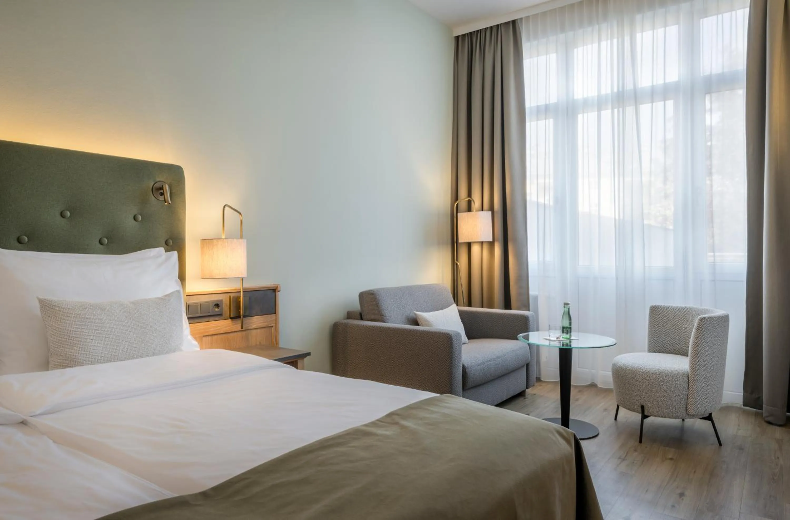 Seating area, Bed in Hotel IMLAUER & Bräu