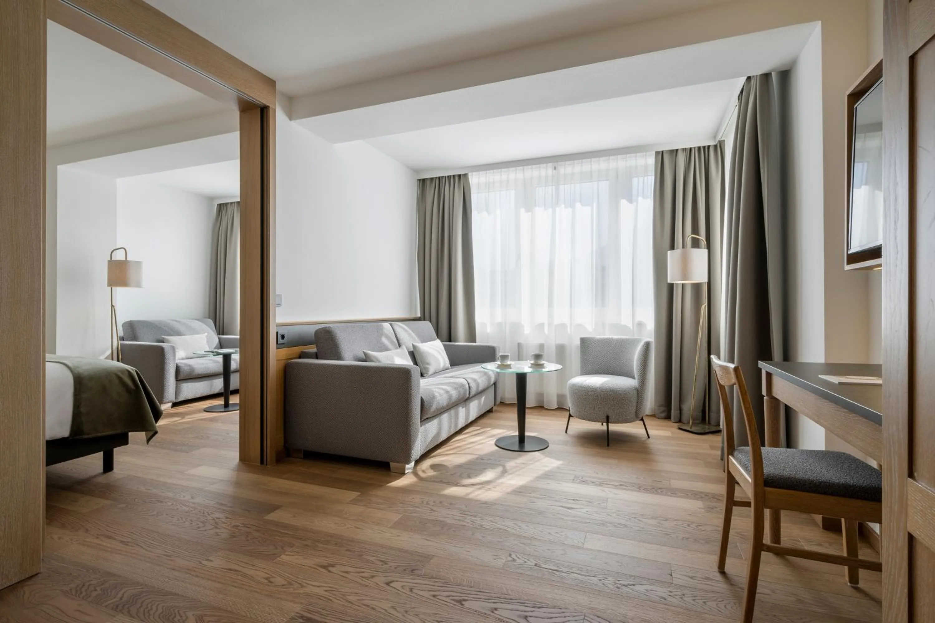 Living room, Bed in Hotel IMLAUER & Bräu