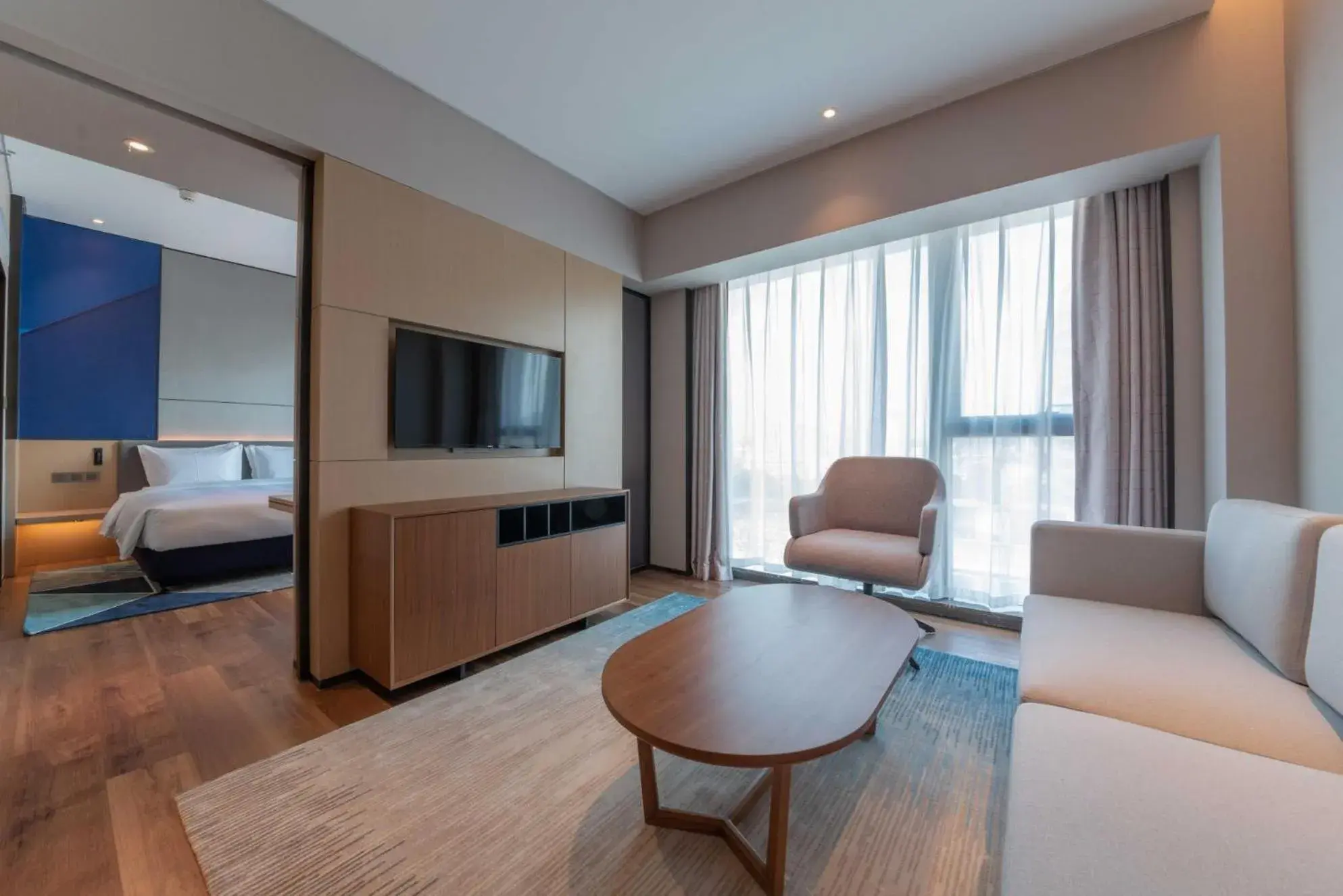 Living room, Bed in Holiday Inn Express Shenzhen Longhua by IHG Living room, Bed in Holiday Inn Express Shenzhen Longhua by IHG