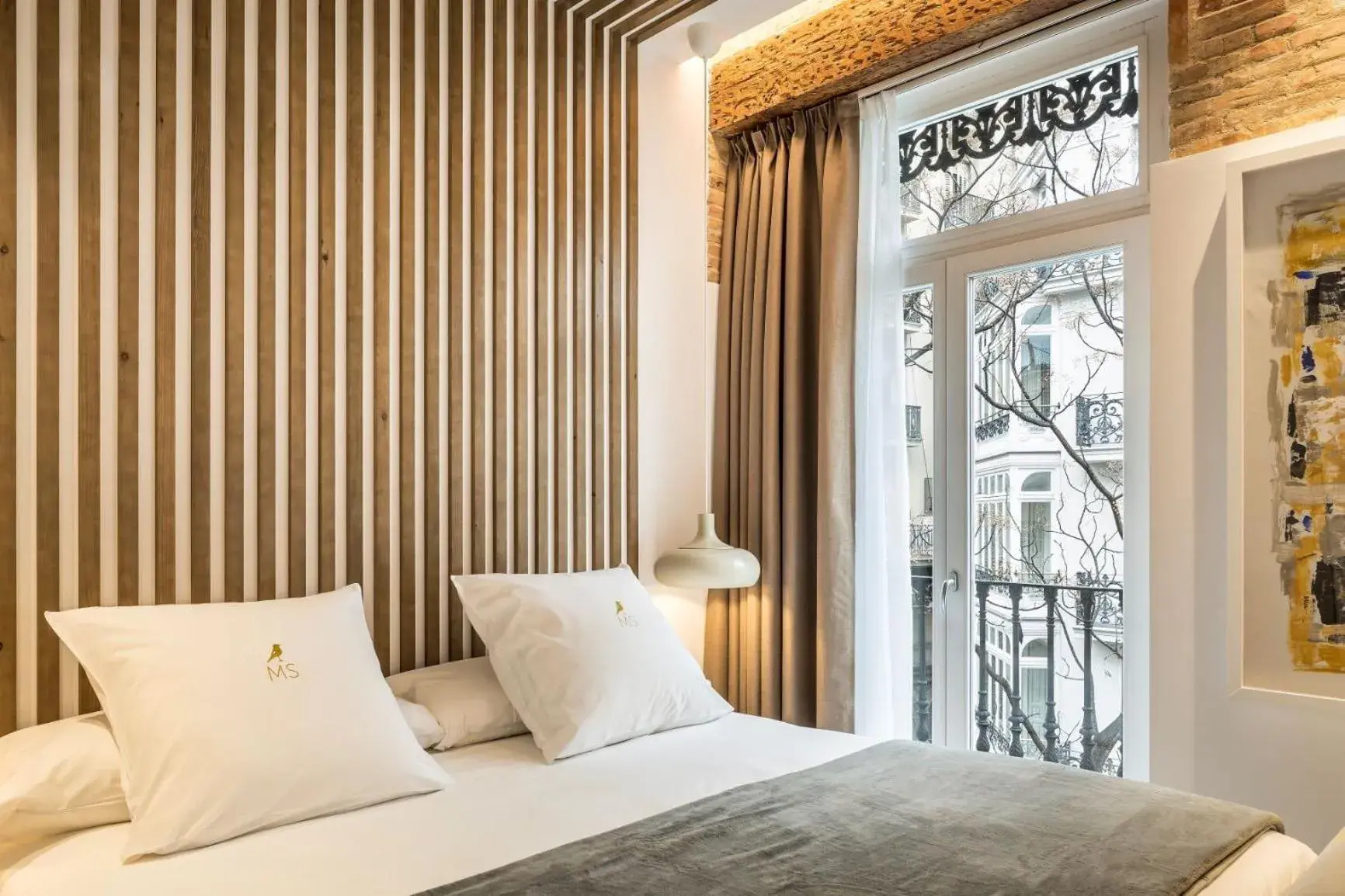 Bed in Mon Suites Benlliure Bed in Mon Suites Benlliure