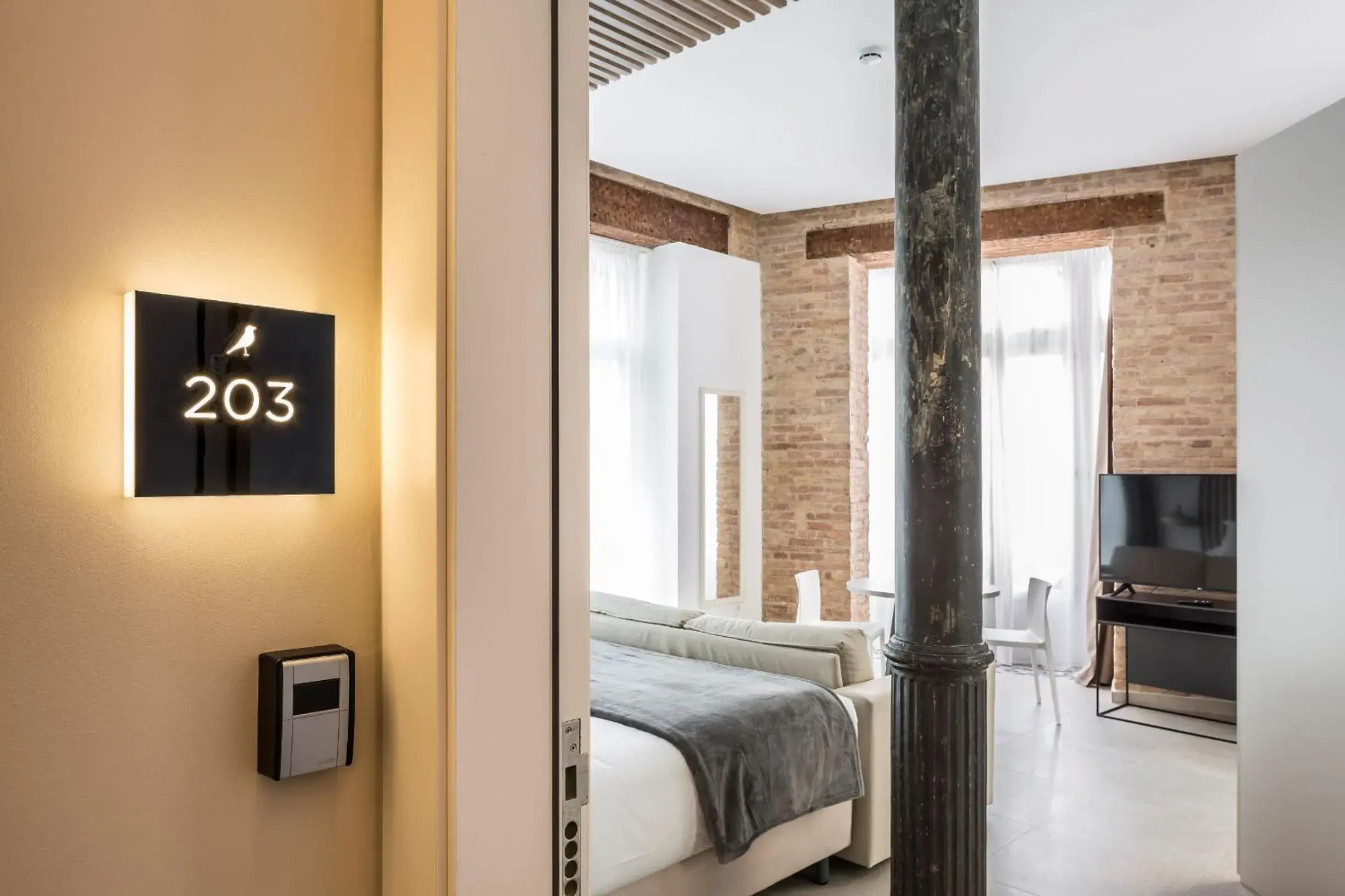 Decorative detail, Bed in Mon Suites Benlliure Decorative detail, Bed in Mon Suites Benlliure