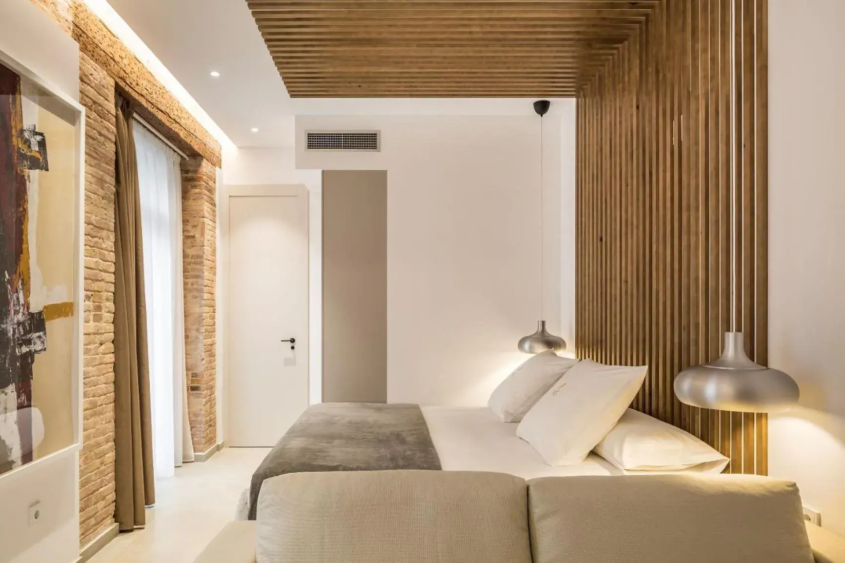 Bed in Mon Suites Benlliure Bed in Mon Suites Benlliure