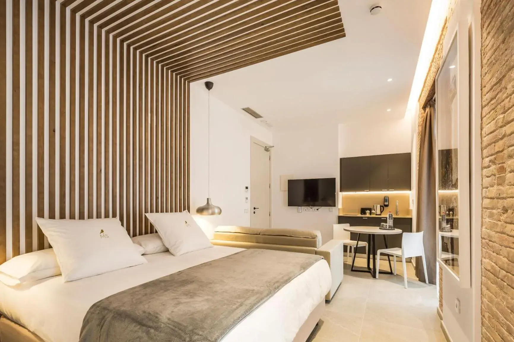 Bed in Mon Suites Benlliure Bed in Mon Suites Benlliure