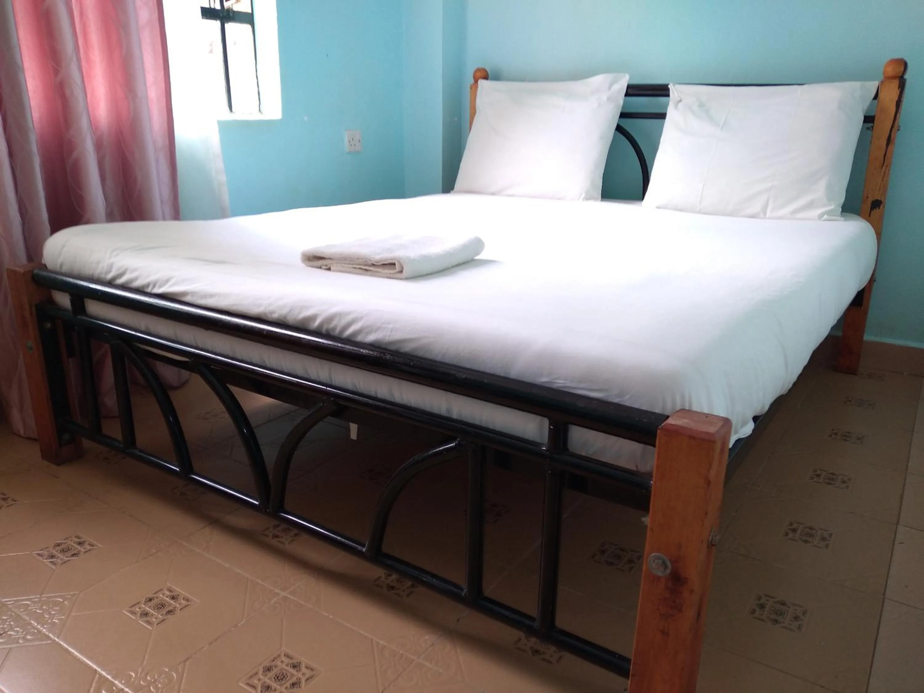 Bed in Crown Hotel Kericho