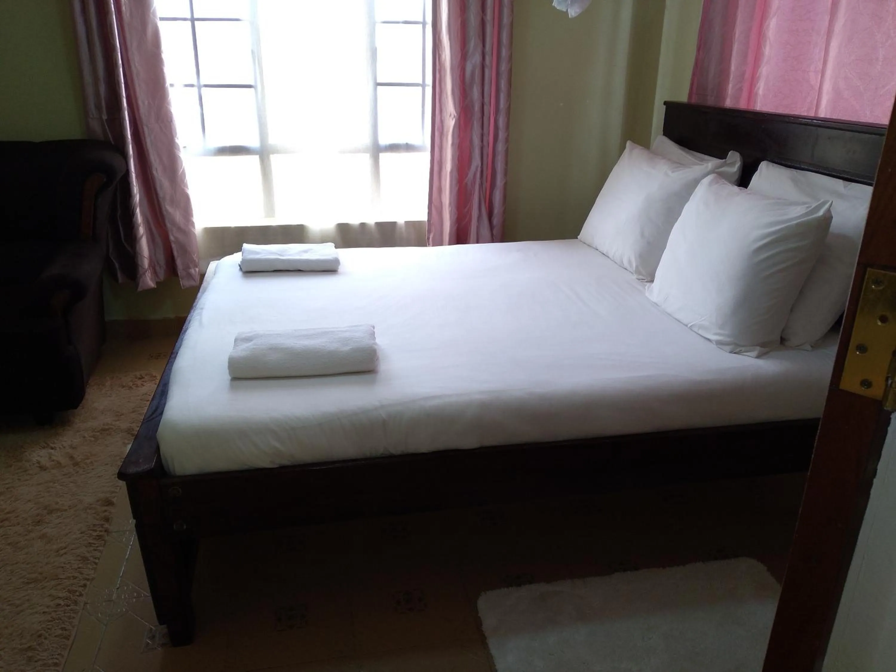 Bed in Crown Hotel Kericho