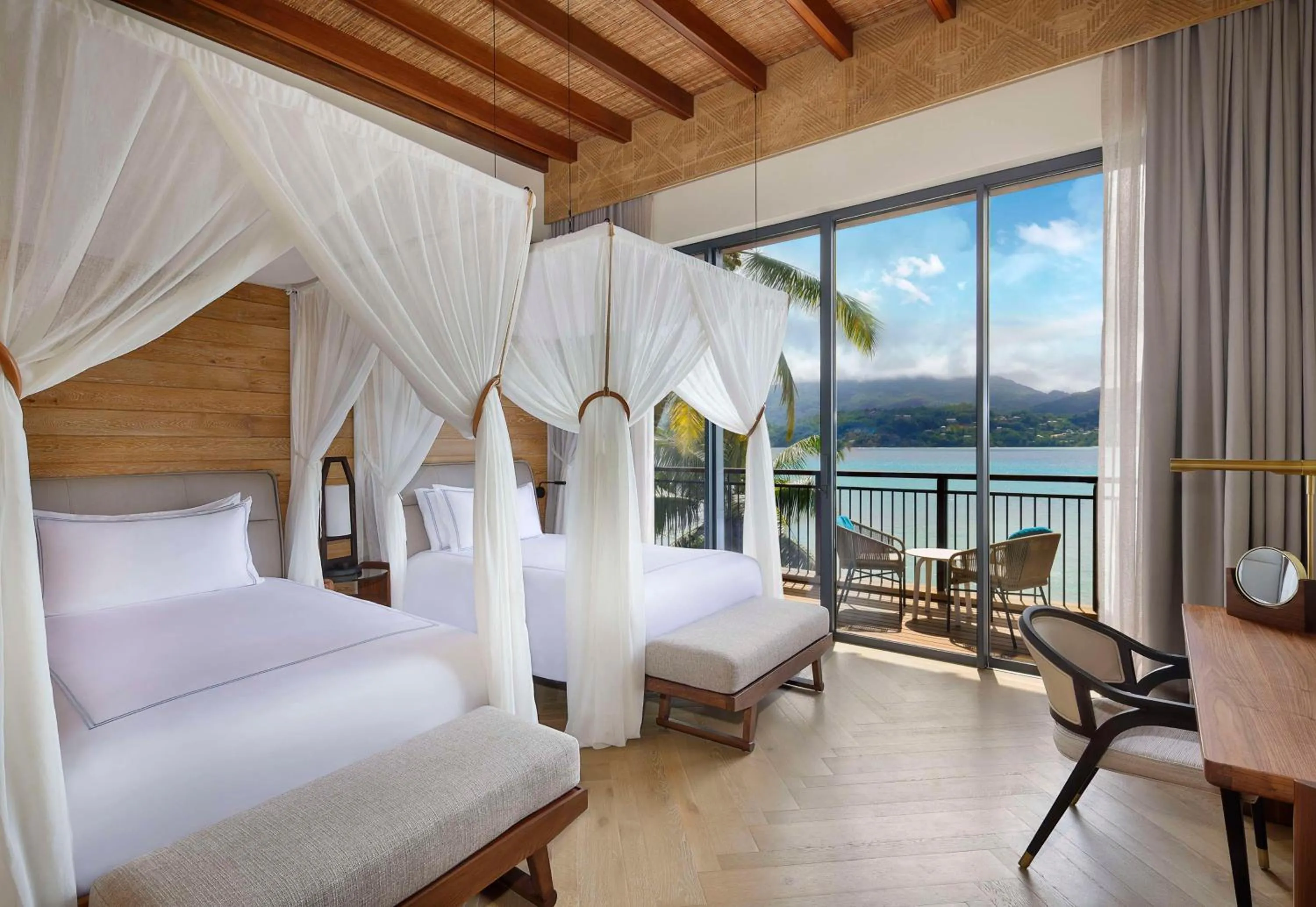 Bed in Mango House Seychelles, LXR Hotels & Resorts