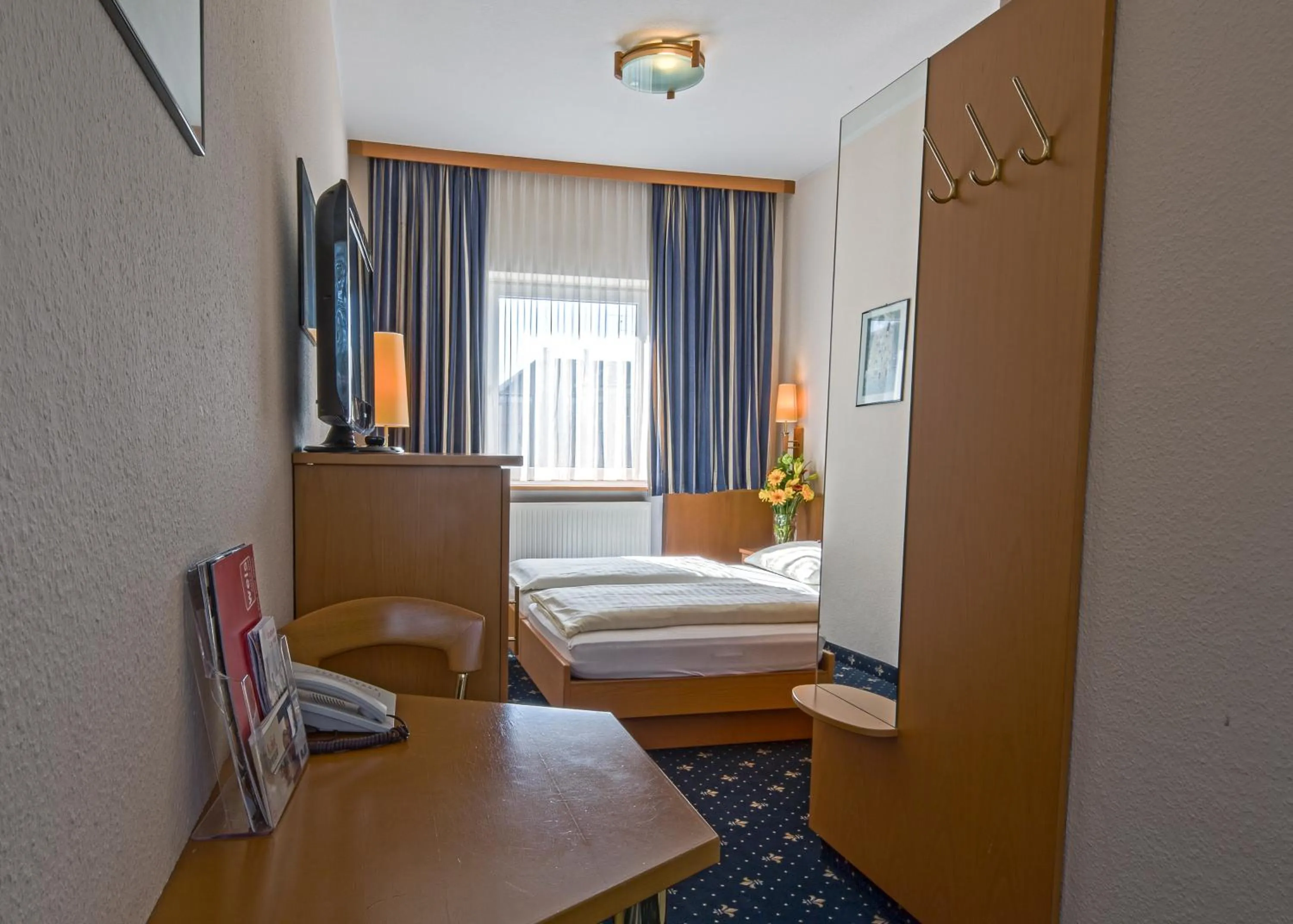 Photo of the whole room, Bed in Hotel Bayrischer Hof