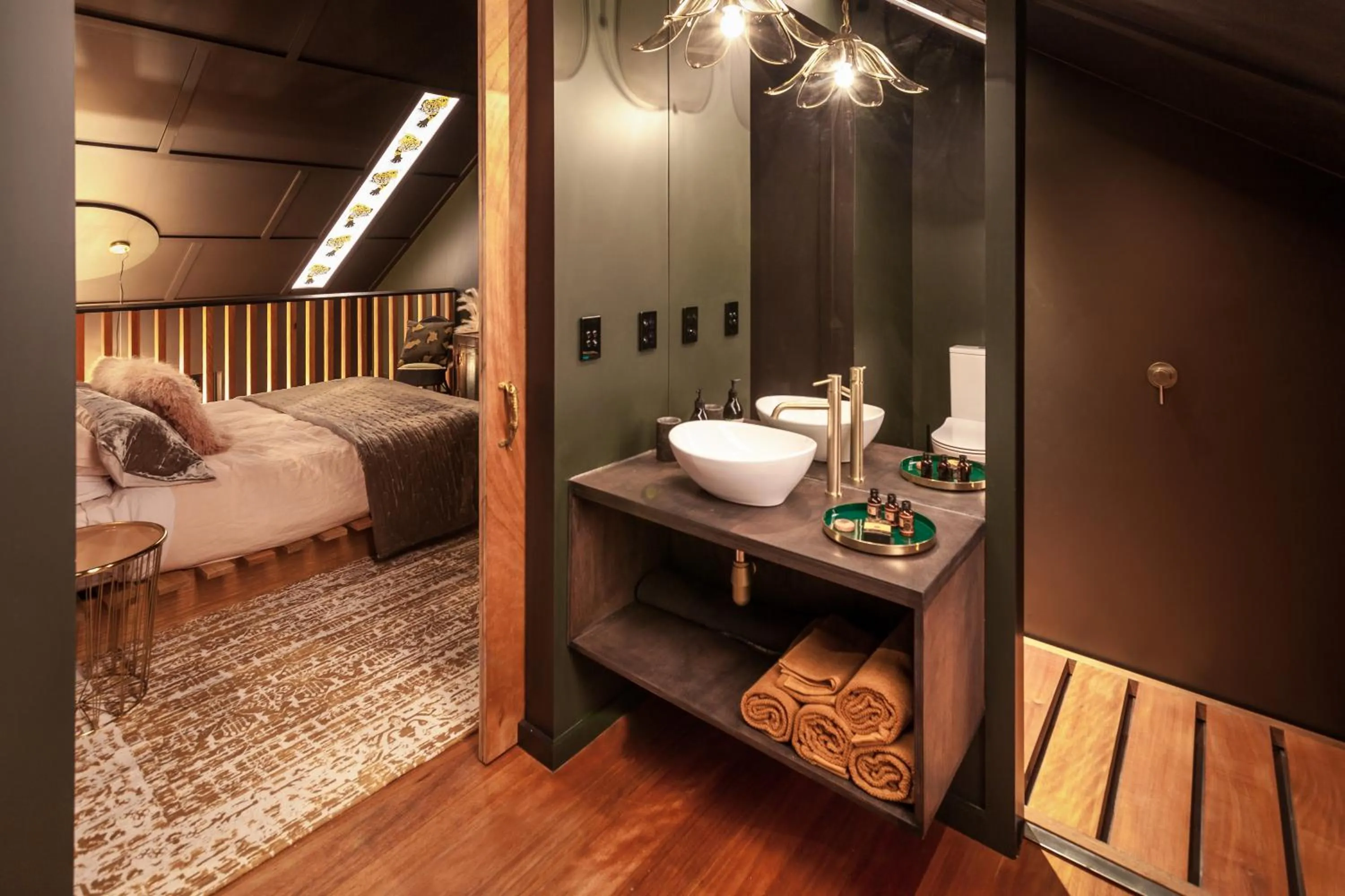 Shower, Bed in The Barn, designers dream beach hideaway