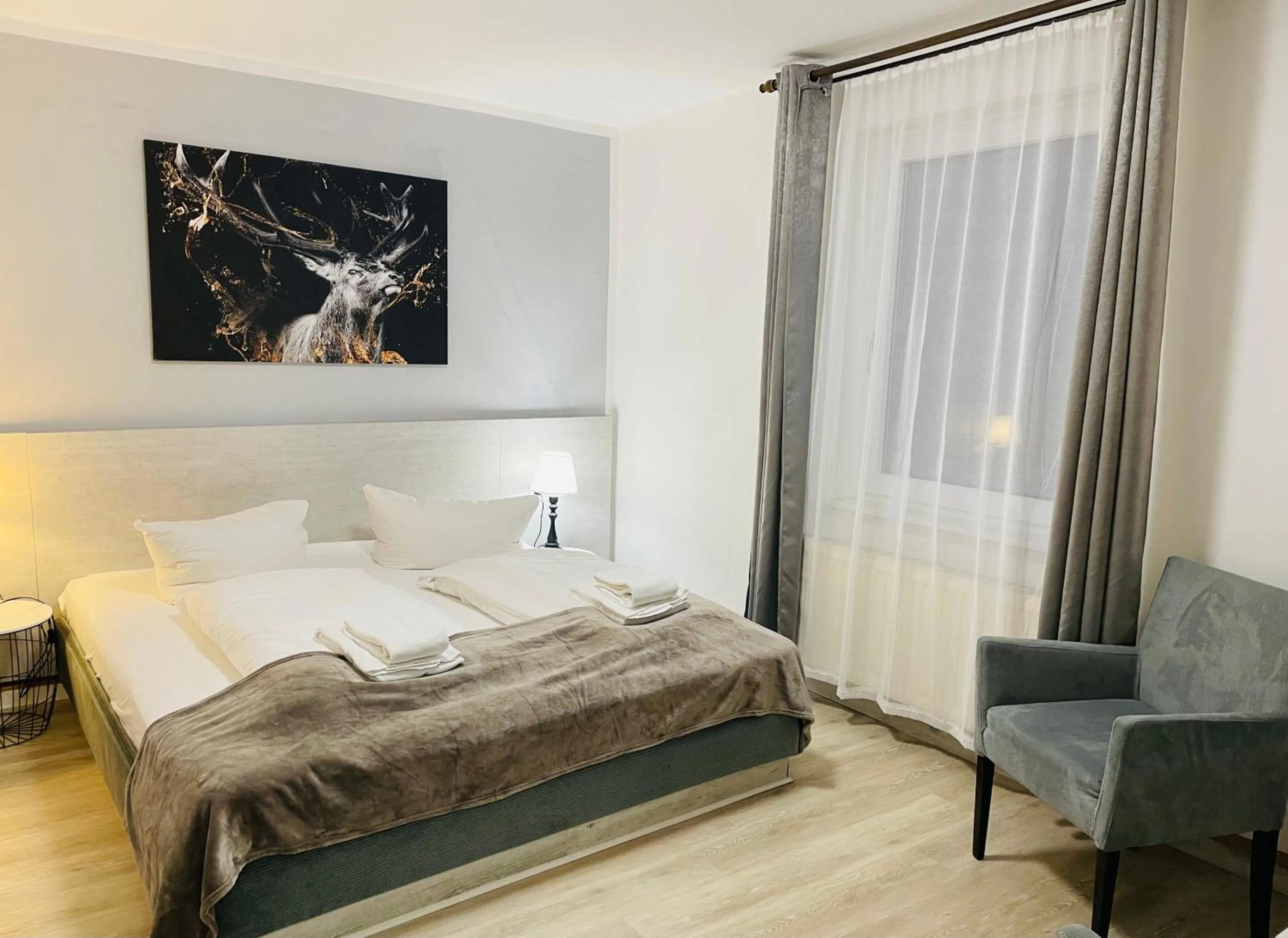 Photo of the whole room, Bed in Harzhotel Warnstedter Krug