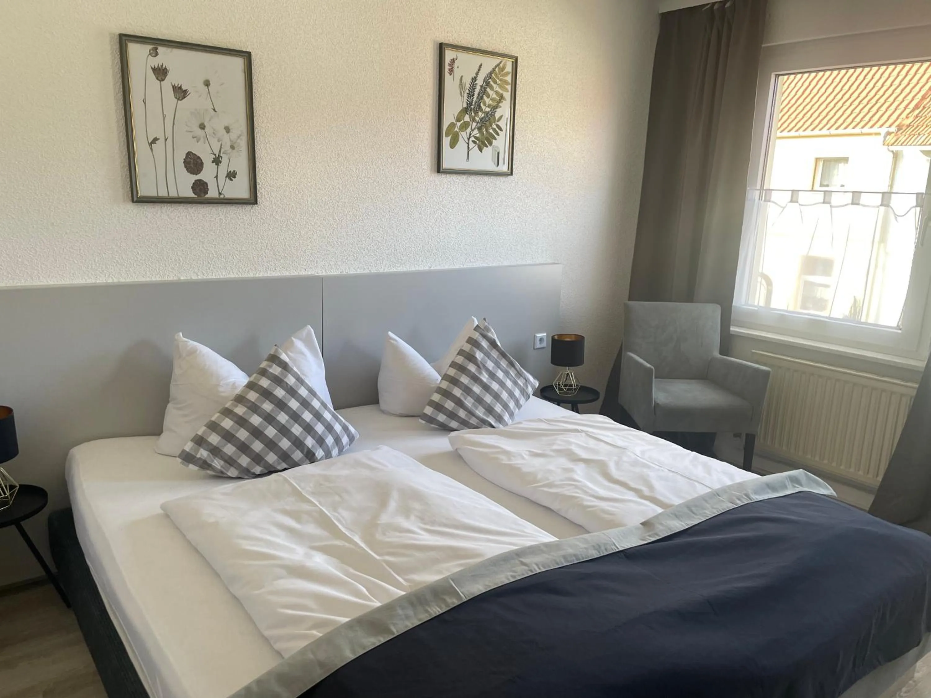 Bed in Harzhotel Warnstedter Krug