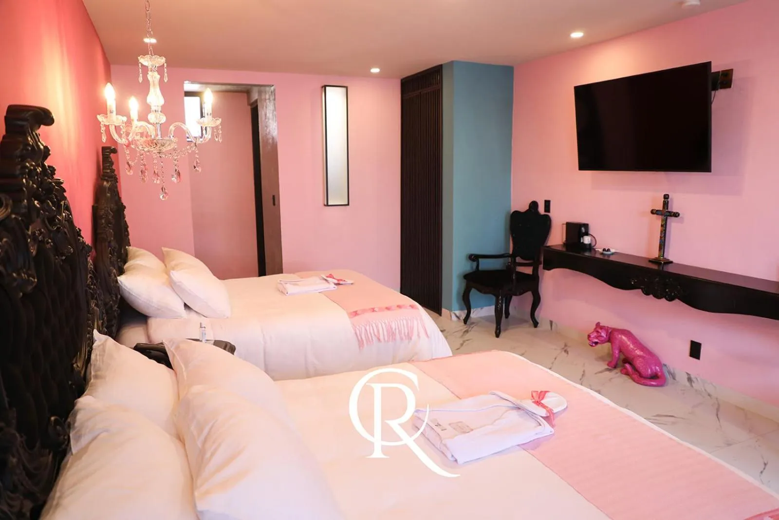 Bed in Casa Rosa Hotel & Spa