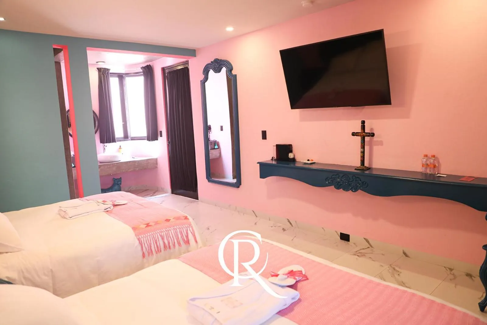 Bed in Casa Rosa Hotel & Spa