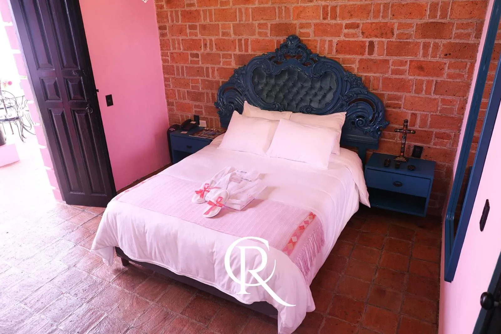 Bed in Casa Rosa Hotel & Spa