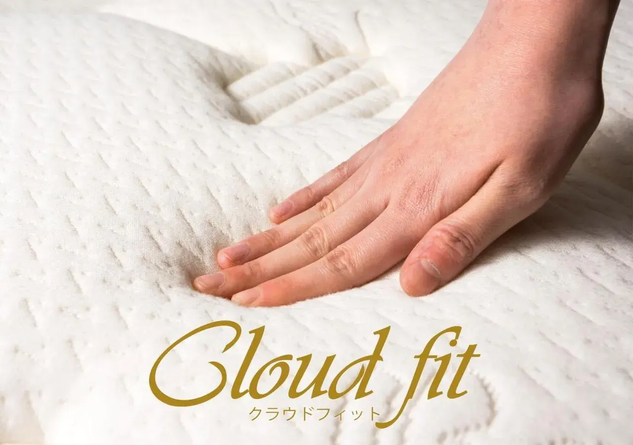 Bed in APA Hotel & Resort Hakata Ekihigashi Bed in APA Hotel & Resort Hakata Ekihigashi