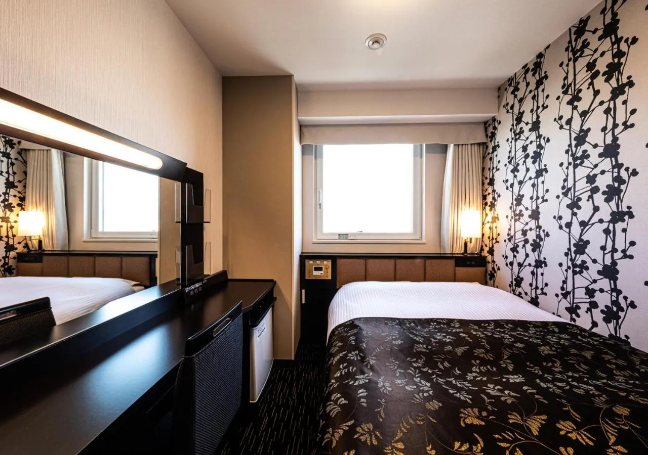 Photo of the whole room, Bed in APA Hotel & Resort Hakata Ekihigashi