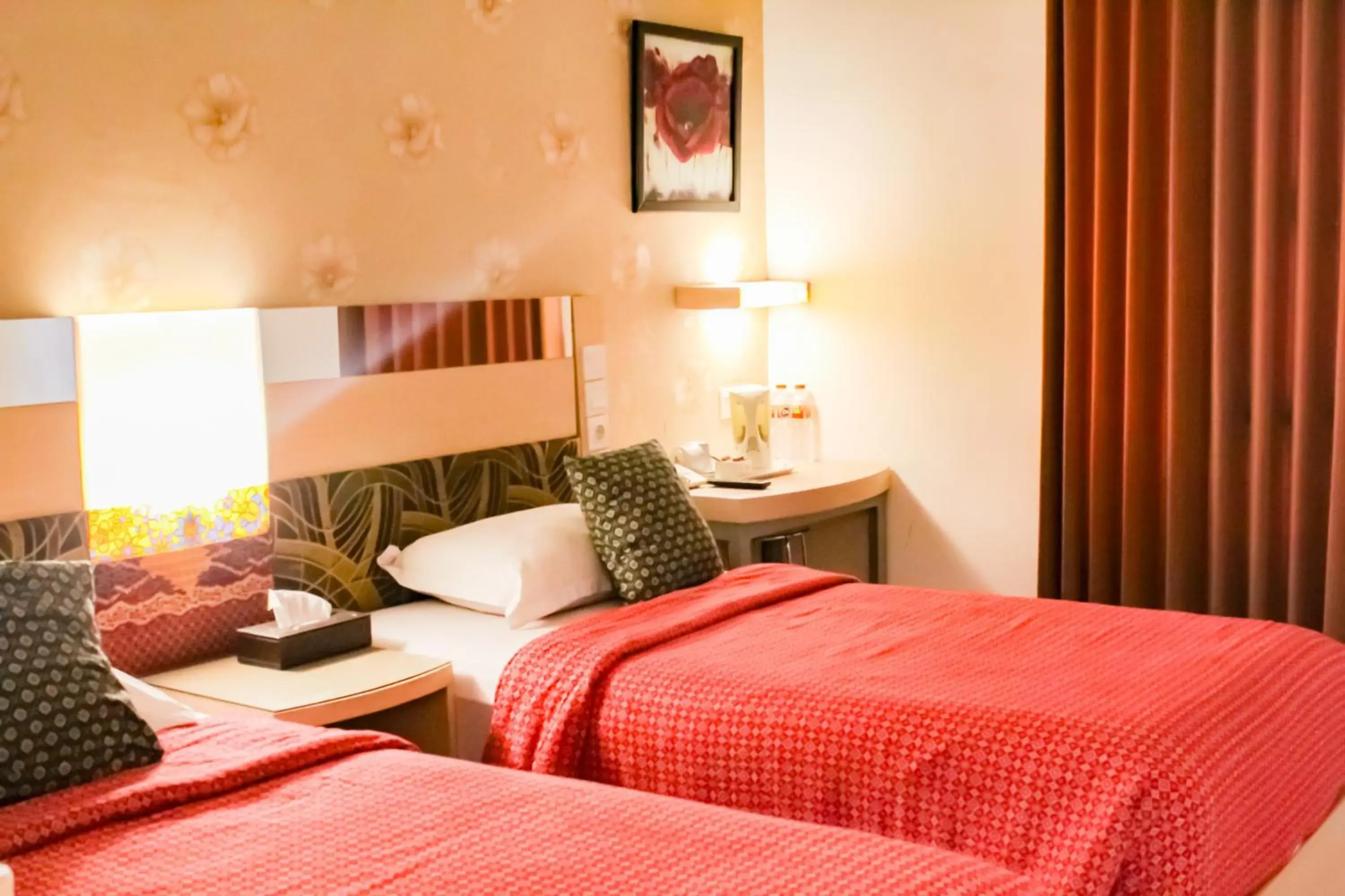 Bed in Hotel Dewarna Sutoyo Malang Bed in Hotel Dewarna Sutoyo Malang