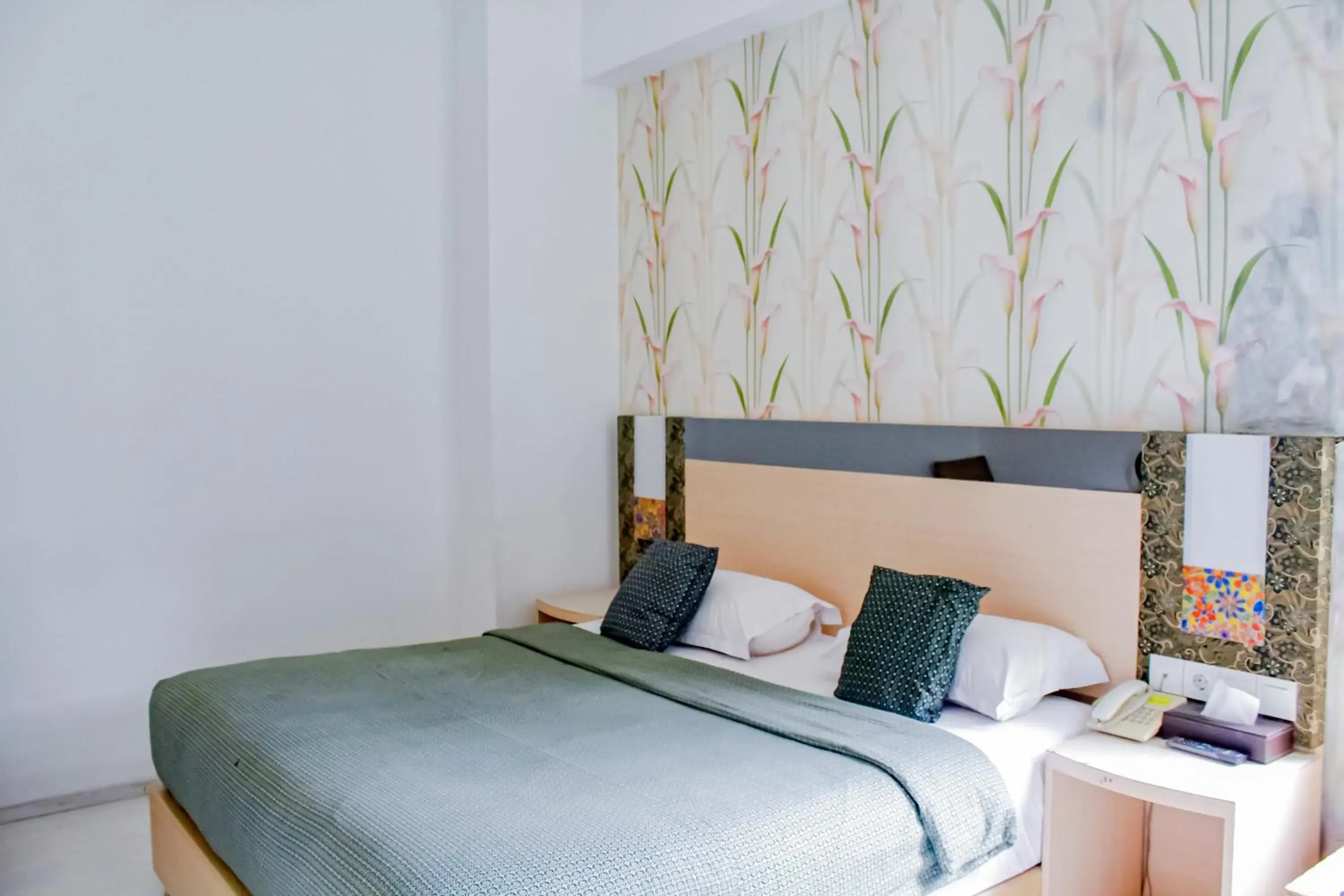 Bed in Hotel Dewarna Sutoyo Malang Bed in Hotel Dewarna Sutoyo Malang