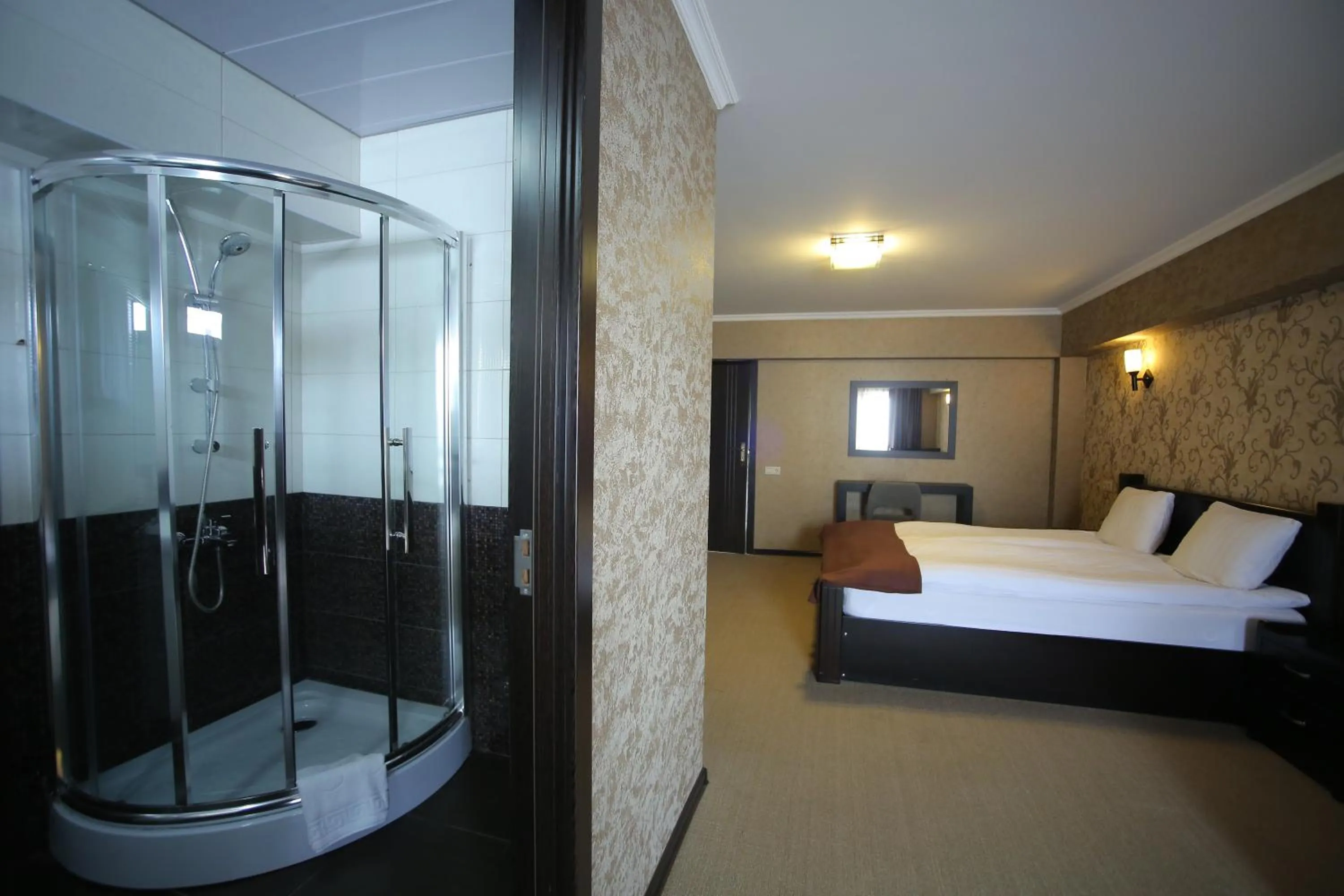 Bed in Hotel GoodAura