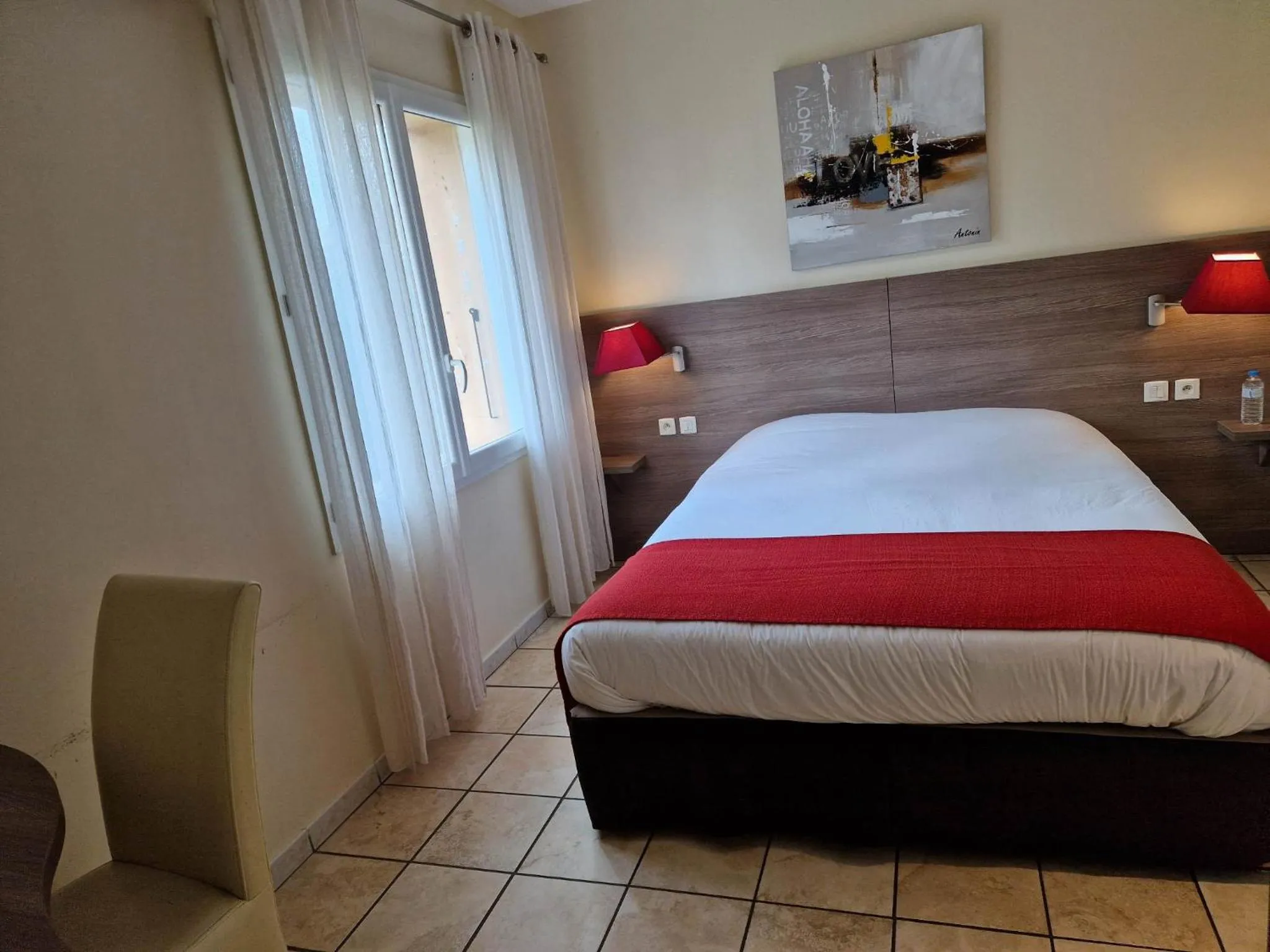 Bed in Hôtel Restaurant Logis Le Relais du Vivarais