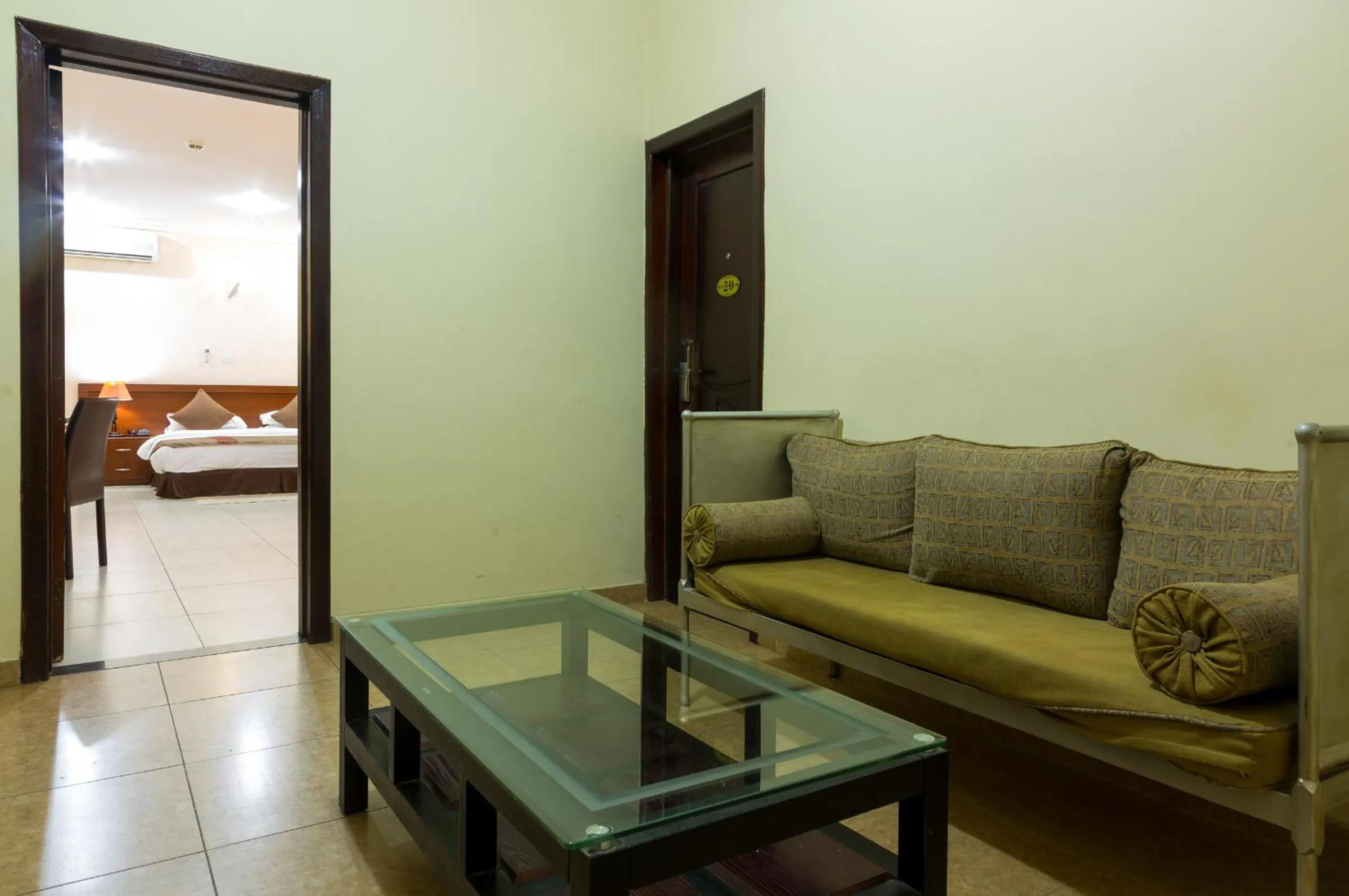 Seating area, Bed in Midindi Hotel
