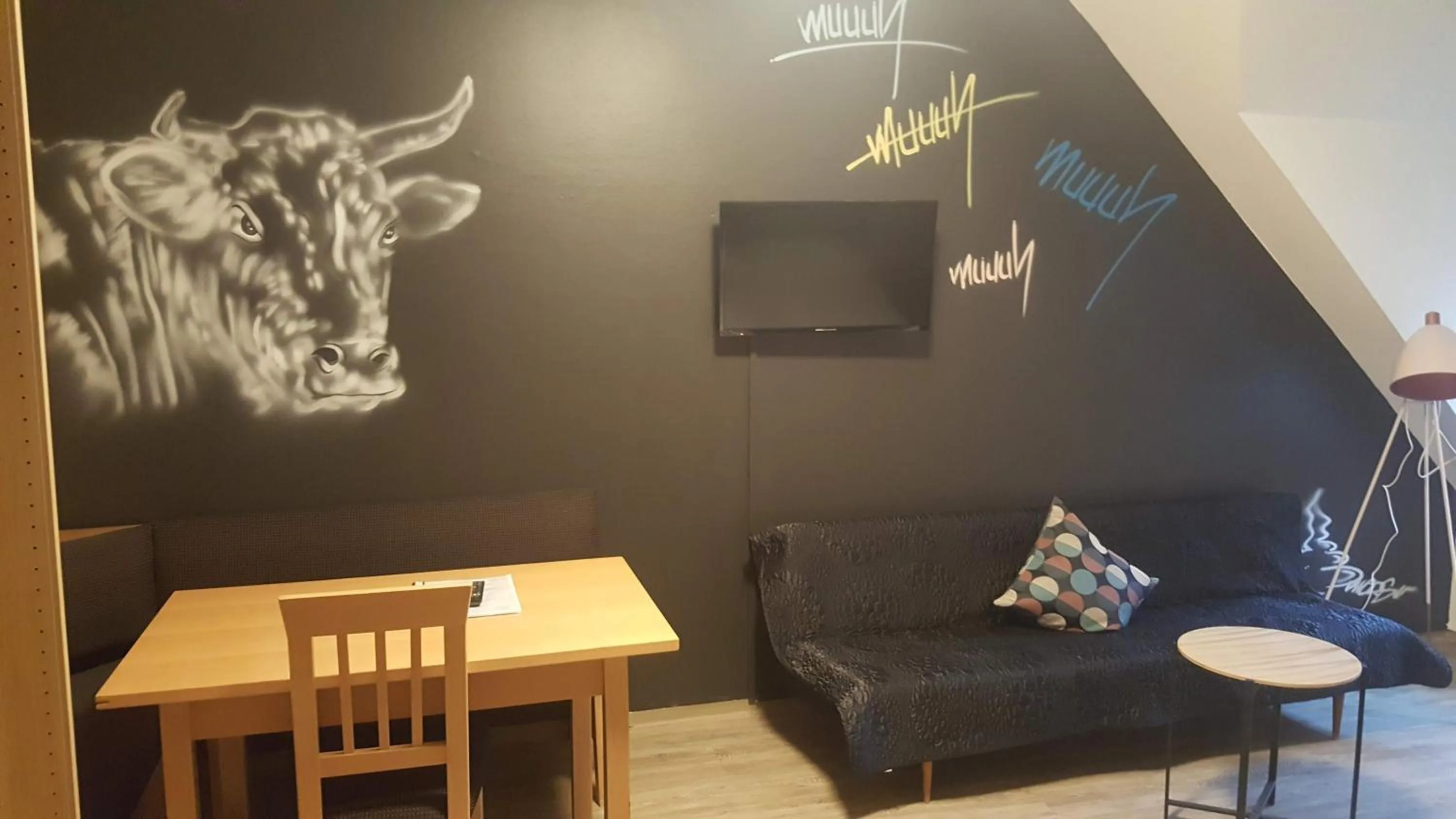 Seating area in Mama Muh Self-Check-in