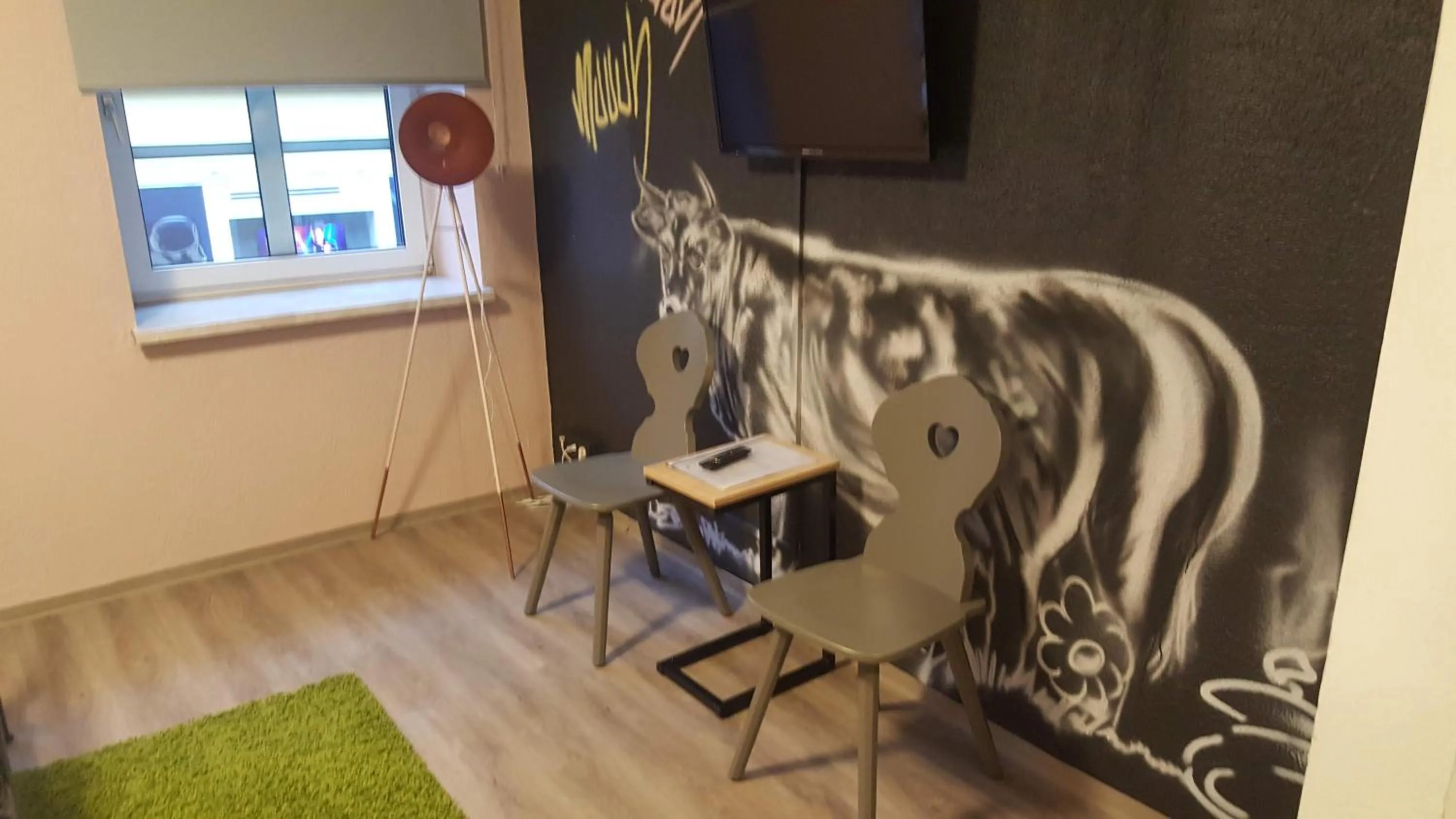 Seating area in Mama Muh Self-Check-in