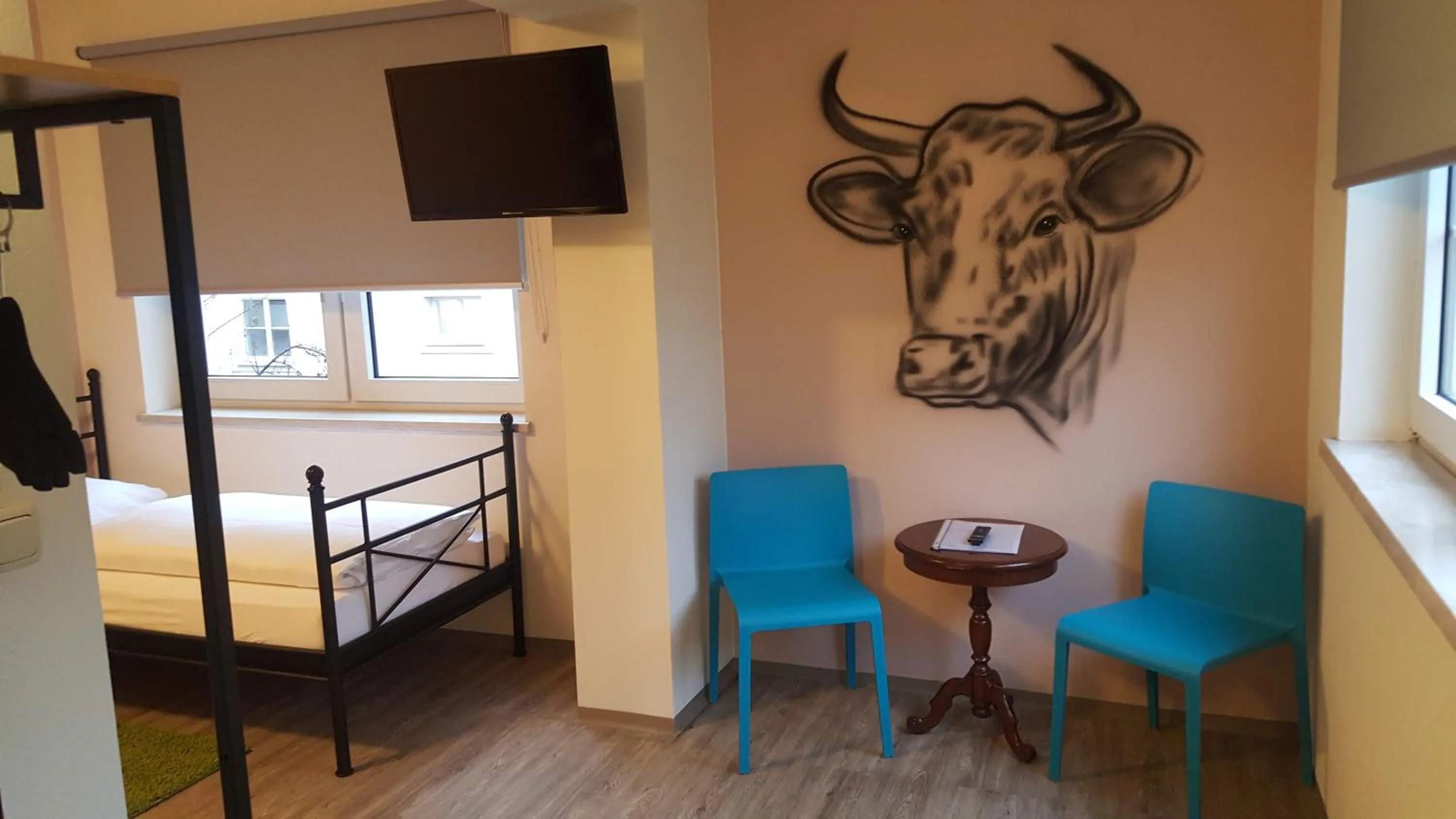 Photo of the whole room, Bed in Mama Muh Self-Check-in