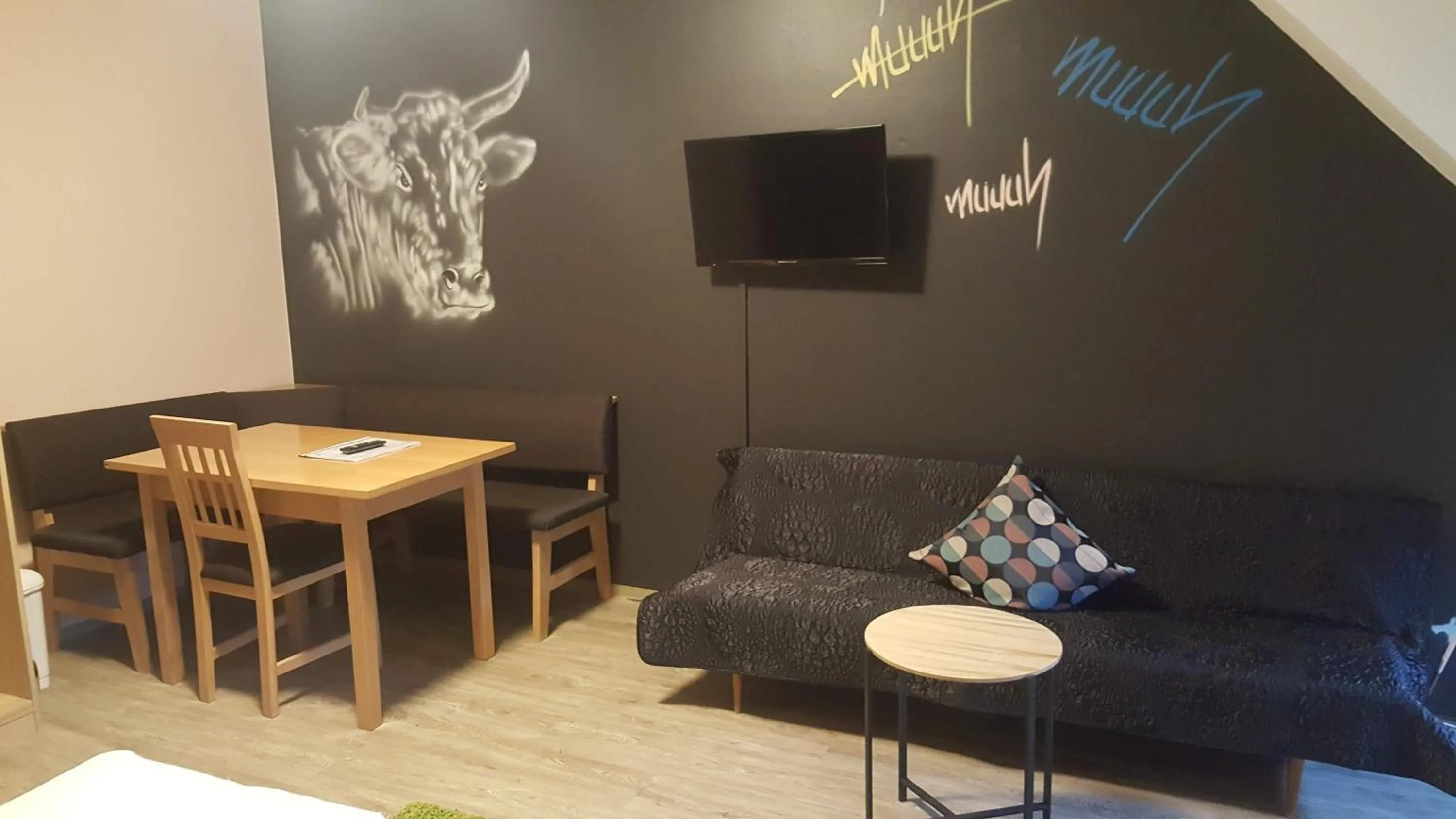 Seating area in Mama Muh Self-Check-in