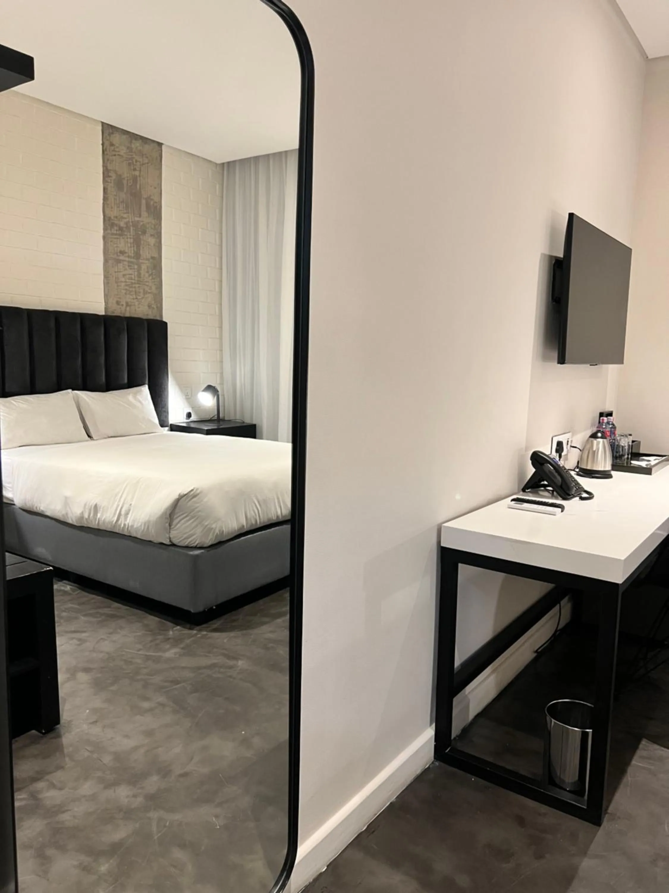 View (from property/room), Bed in The Urban Hotel Lusaka