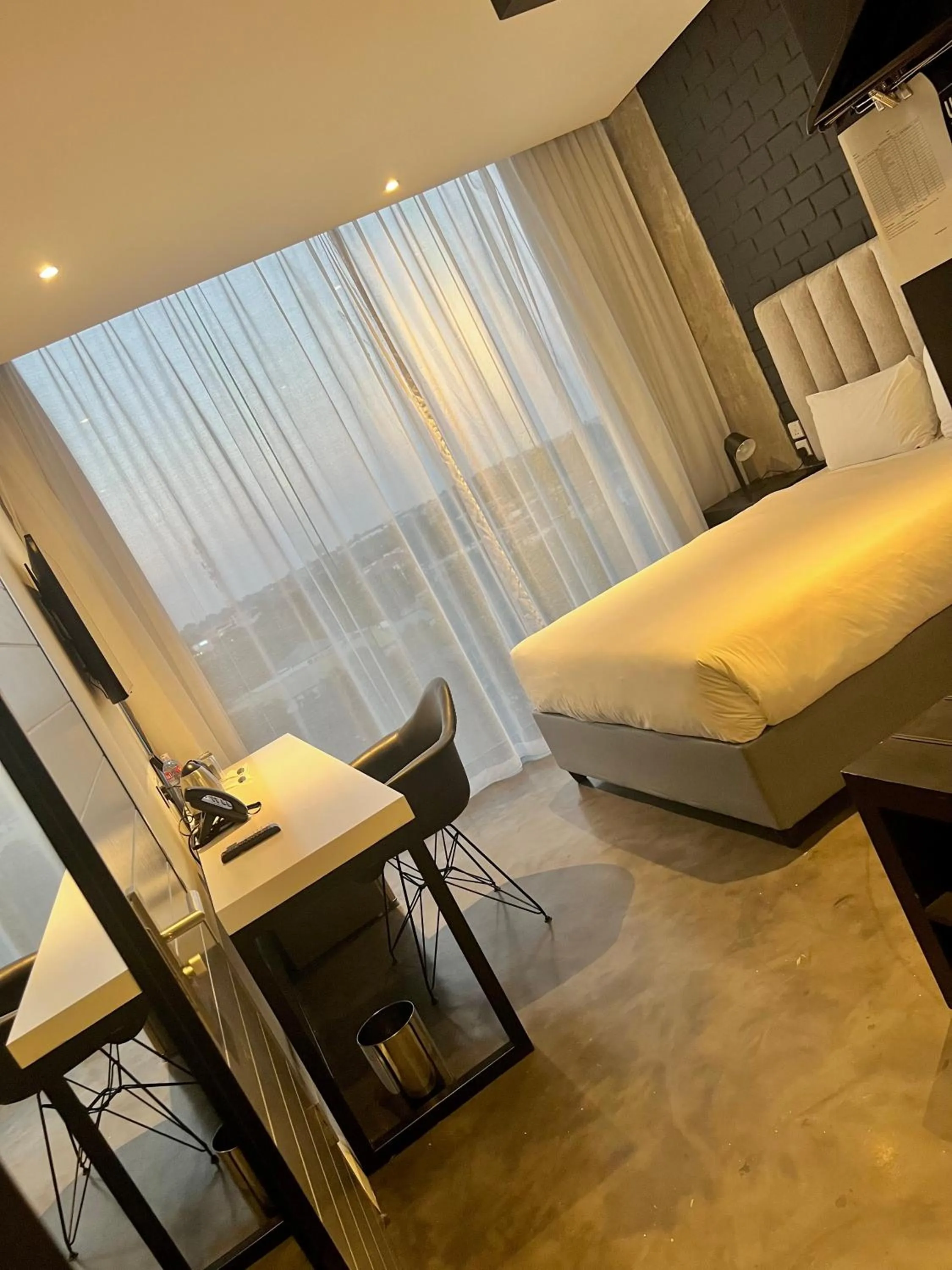 Bed in The Urban Hotel Lusaka