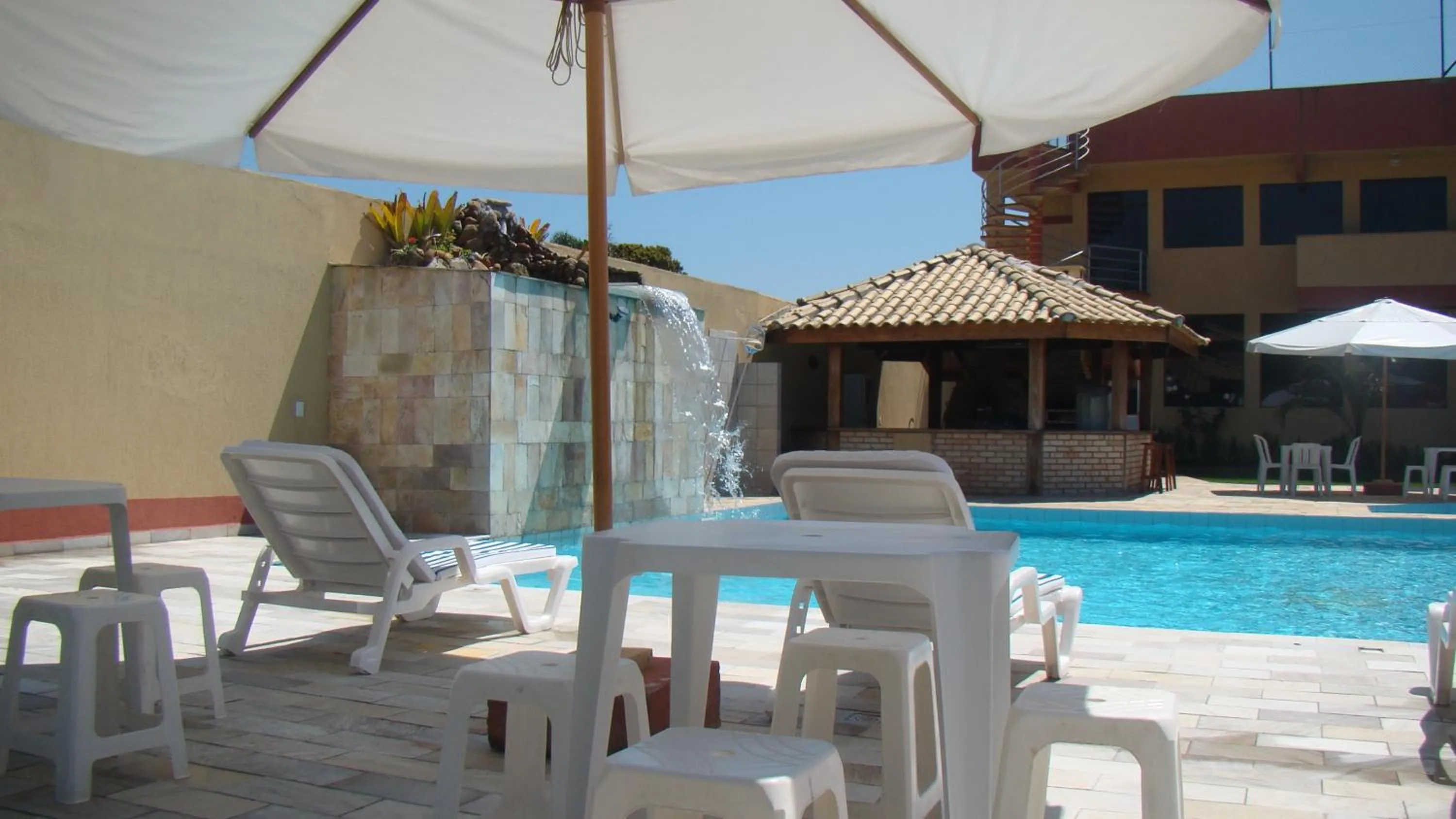 Swimming pool in Pousada Vale Del Sol