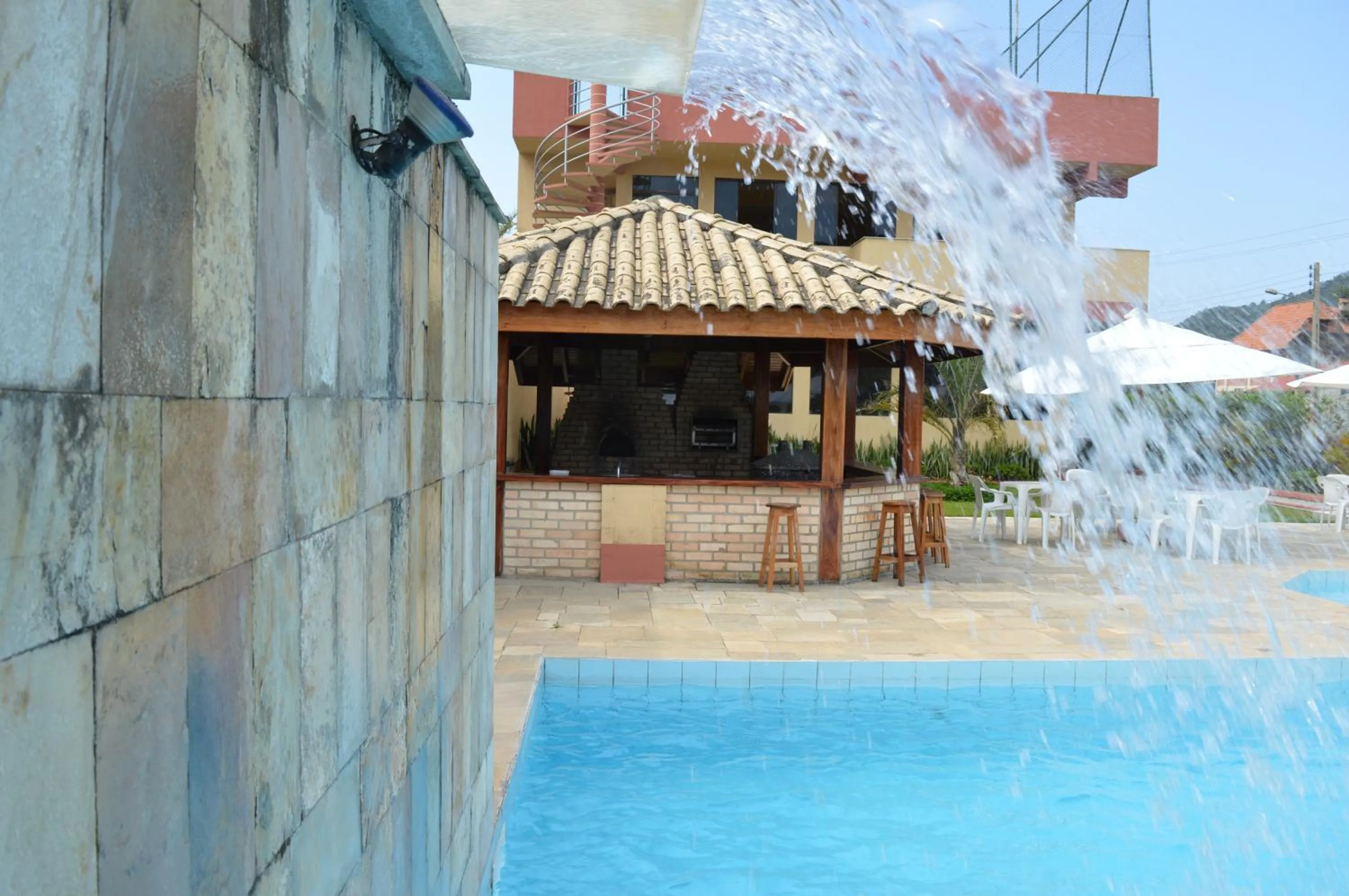 Swimming pool in Pousada Vale Del Sol