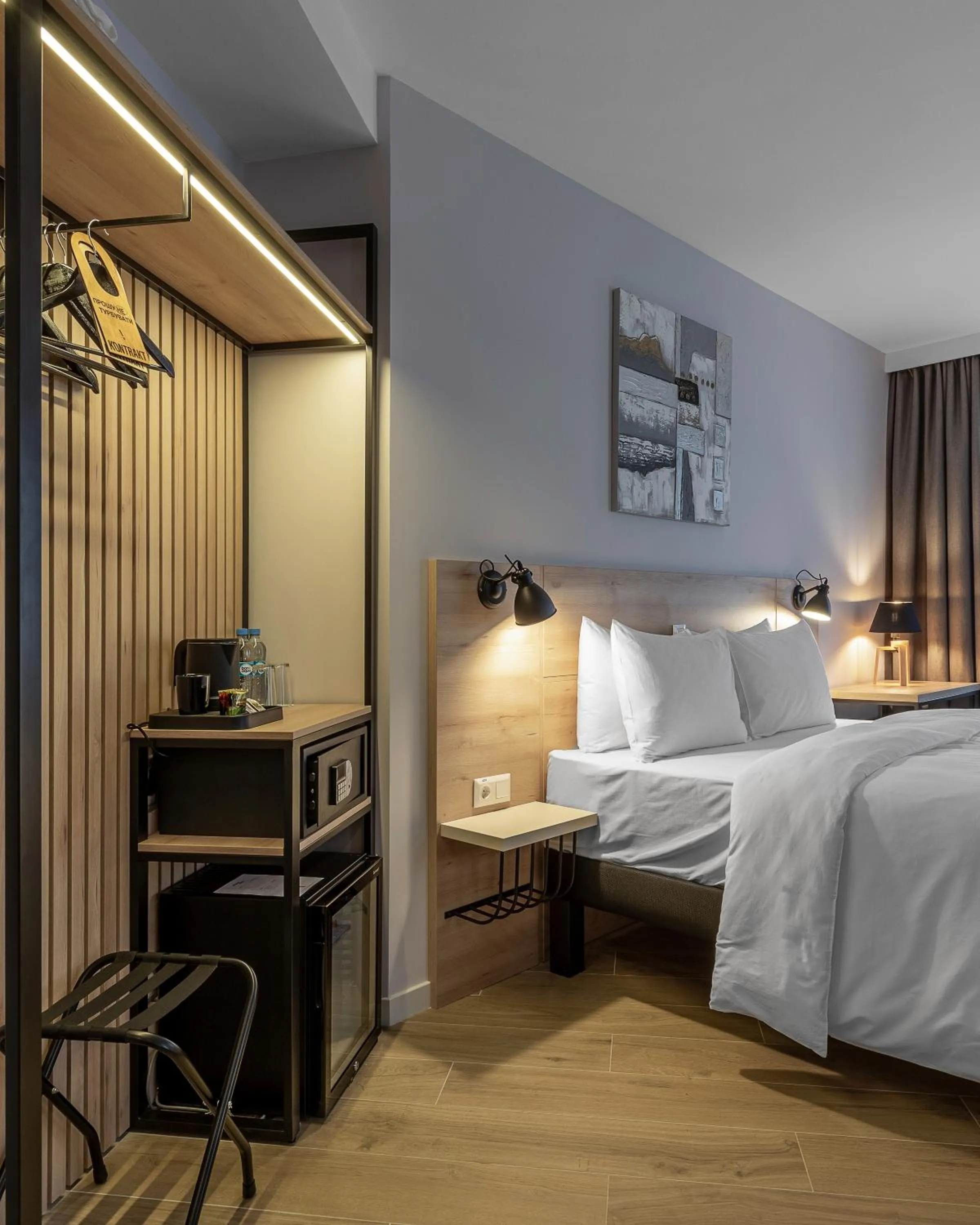 Bed in KONTRAKT Boutique Hotel