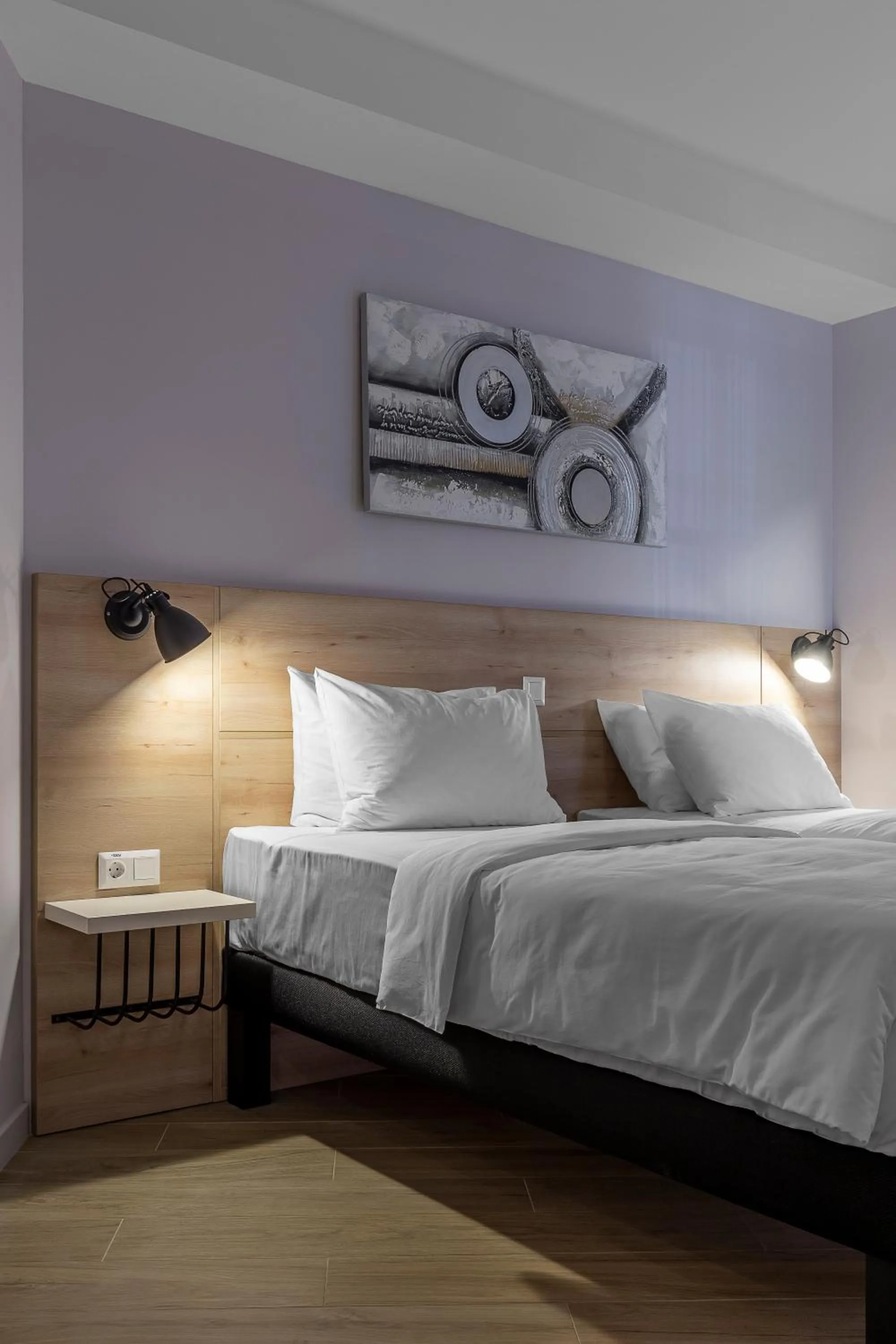 Bed in KONTRAKT Boutique Hotel