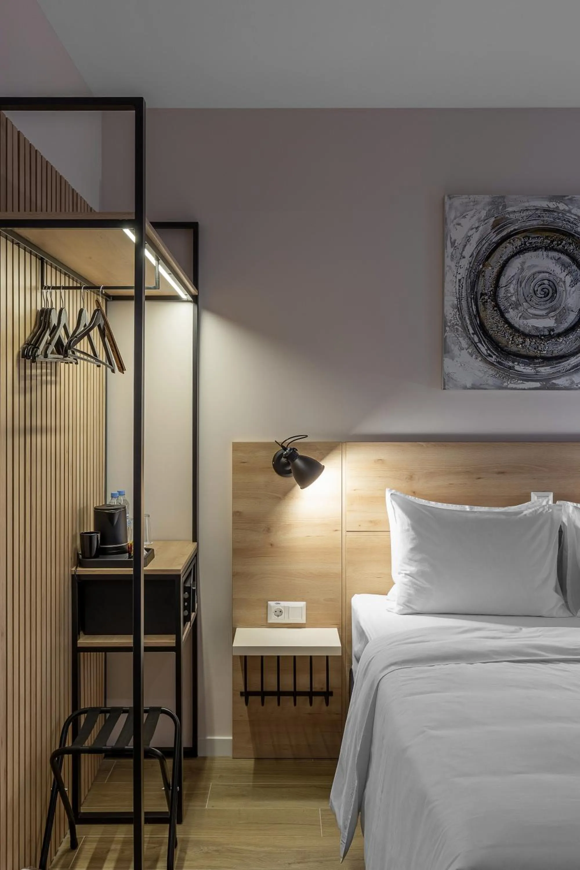 Bed in KONTRAKT Boutique Hotel