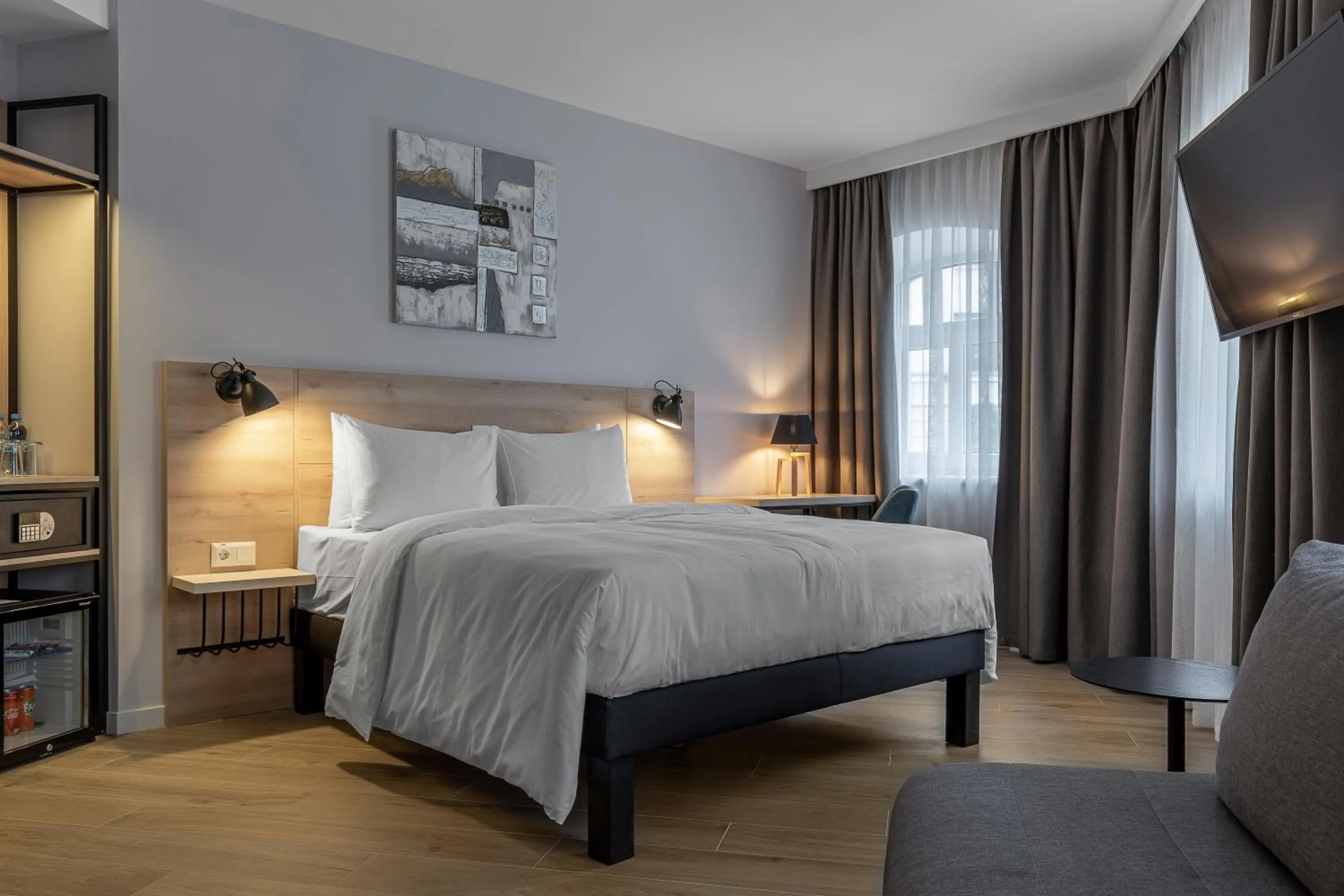 Bed in KONTRAKT Boutique Hotel