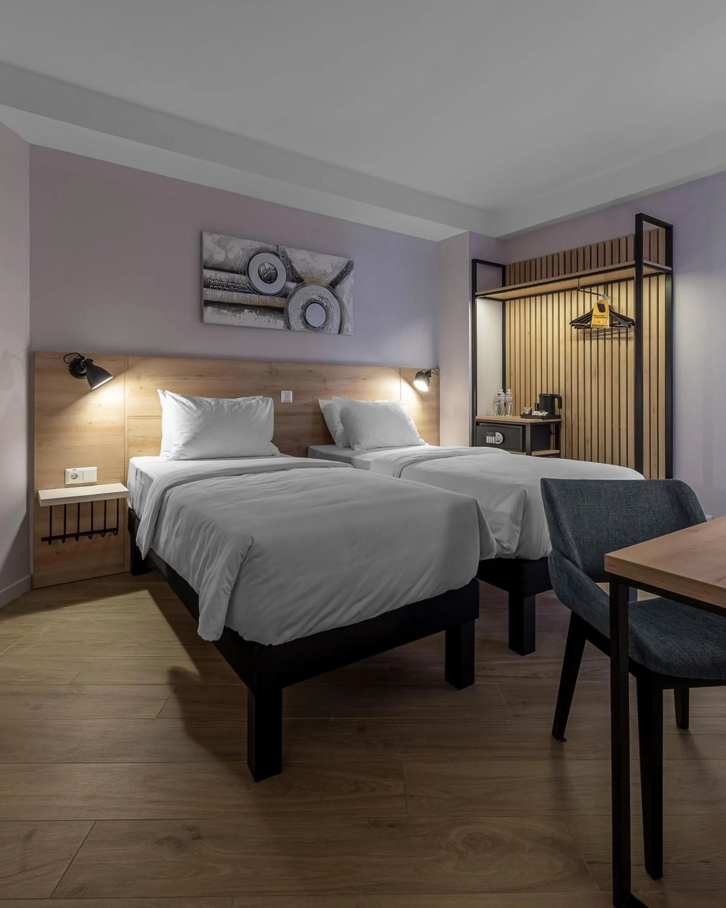 Bed in KONTRAKT Boutique Hotel