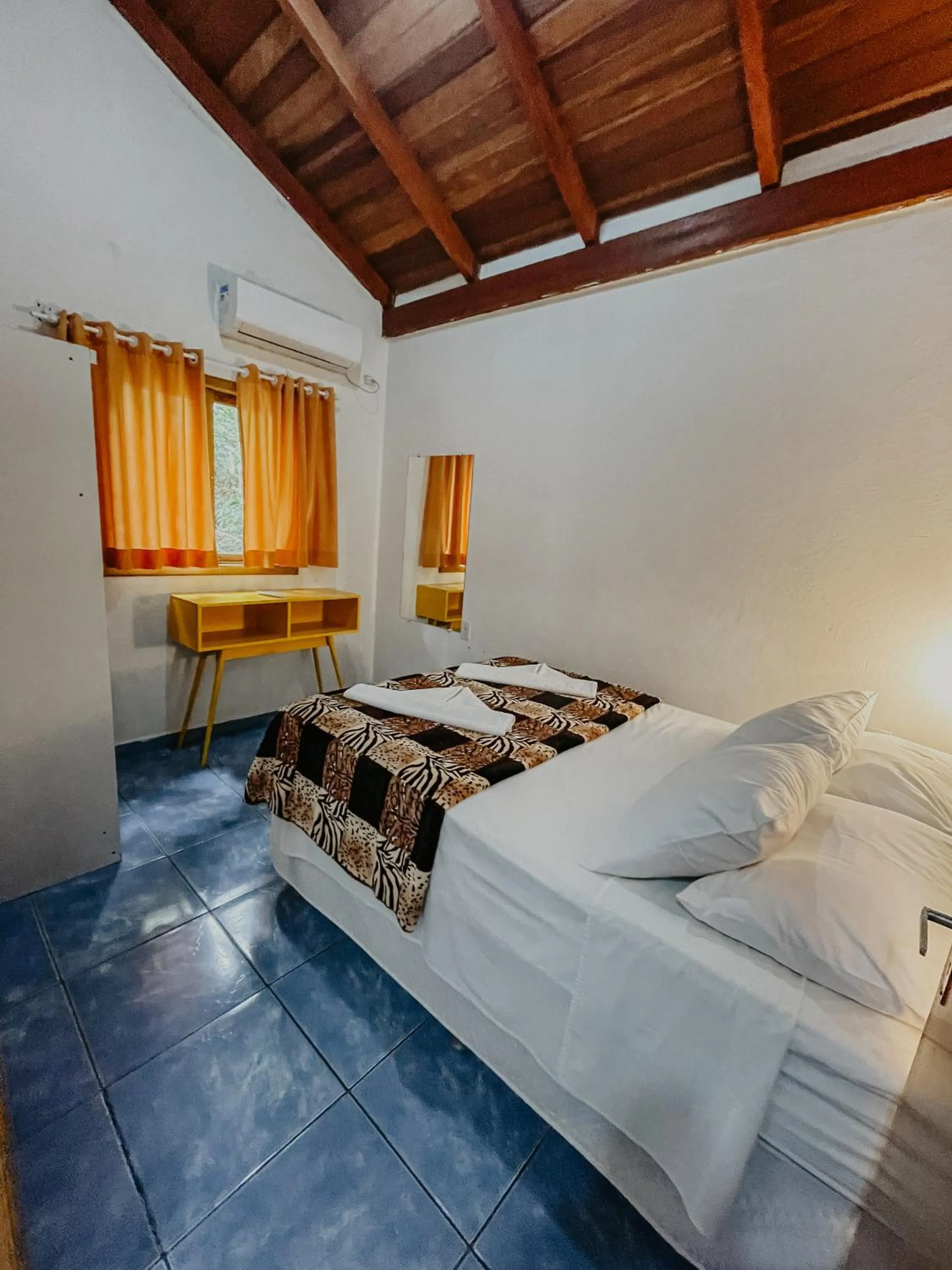 Bed in Pousada Praia de Bombinhas